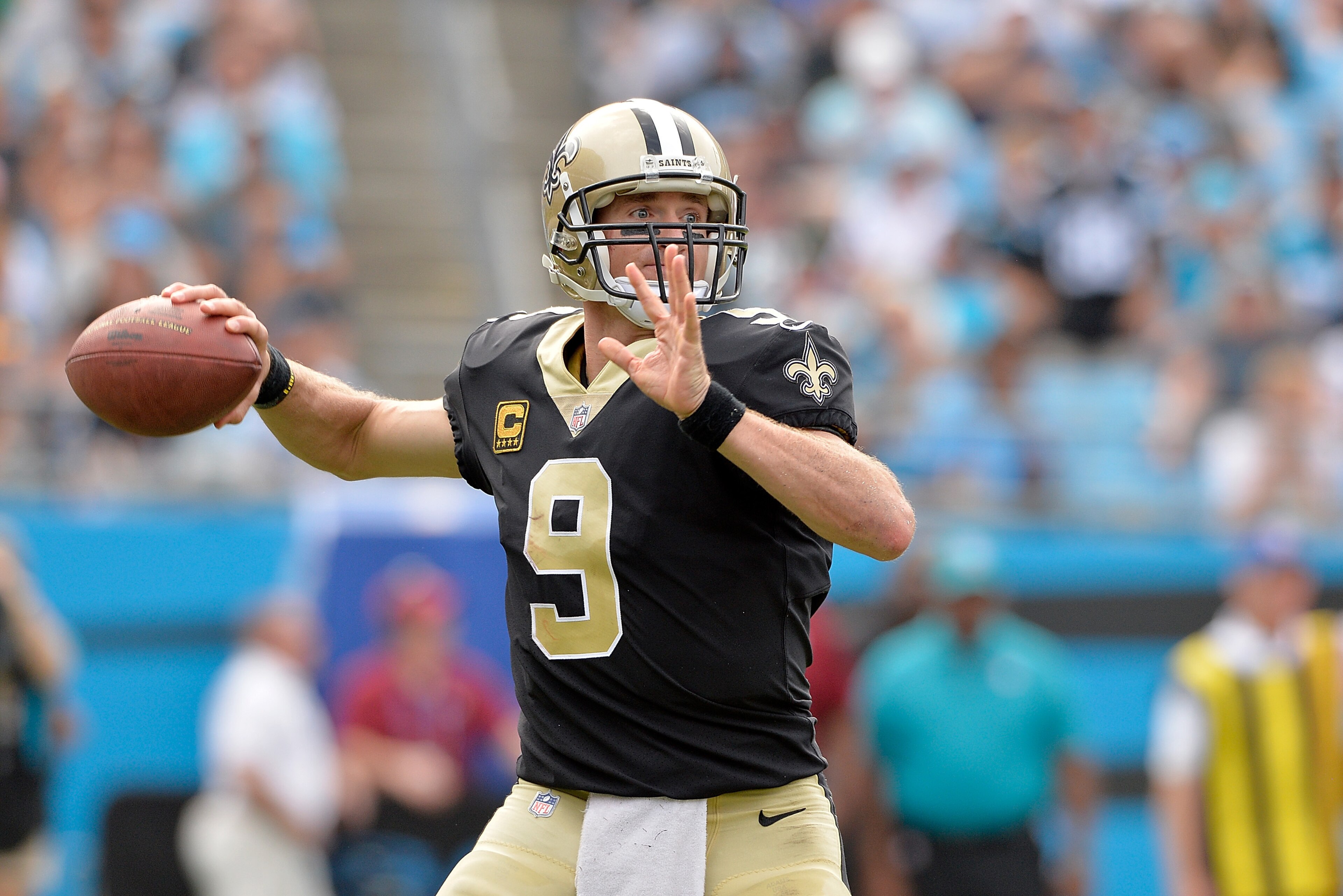 CHARLOTTE, NC - SEPTEMBER 24: Drew Brees #9 of the New Orleans Saints drops back to pass against the Carolina Panthers during their game at Bank of America Stadium on September 24, 2017 in Charlotte, North Carolina. (Photo by Grant Halverson/Getty Image CHARLOTTE, NC - SEPTEMBER 24: Drew Brees #9 of the New Orleans Saints drops back to pass against the Carolina Panthers during their game at Bank of America Stadium on September 24, 2017 in Charlotte, North Carolina. (Photo by Grant Halverson/Getty Image