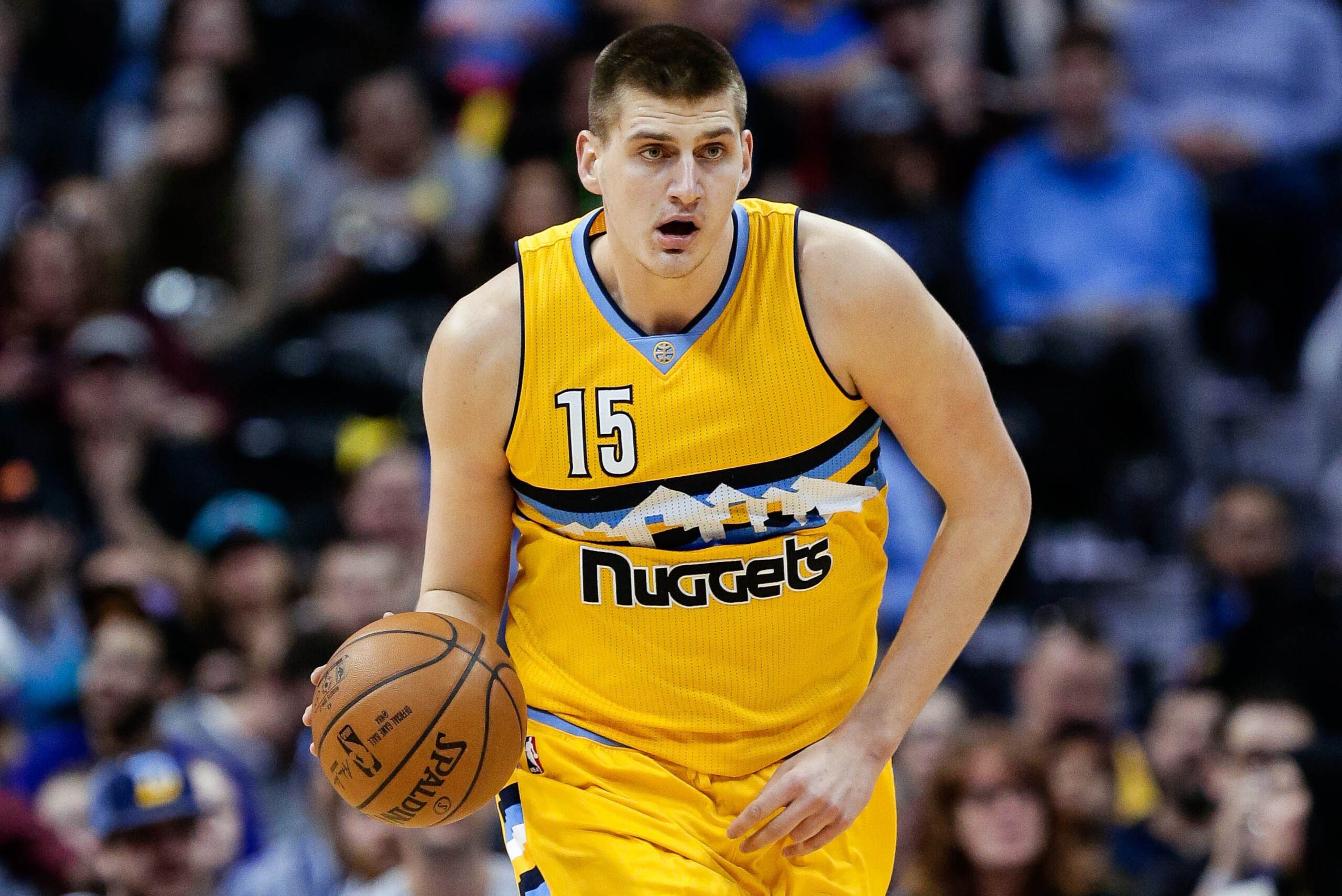 Mar 4, 2017; Denver, CO, USA; Denver Nuggets forward Nikola Jokic (15) dribbles the ball up court in the second quarter against the Charlotte Hornets at the Pepsi Center. Mandatory Credit: Isaiah J. Downing-USA TODAY Sports