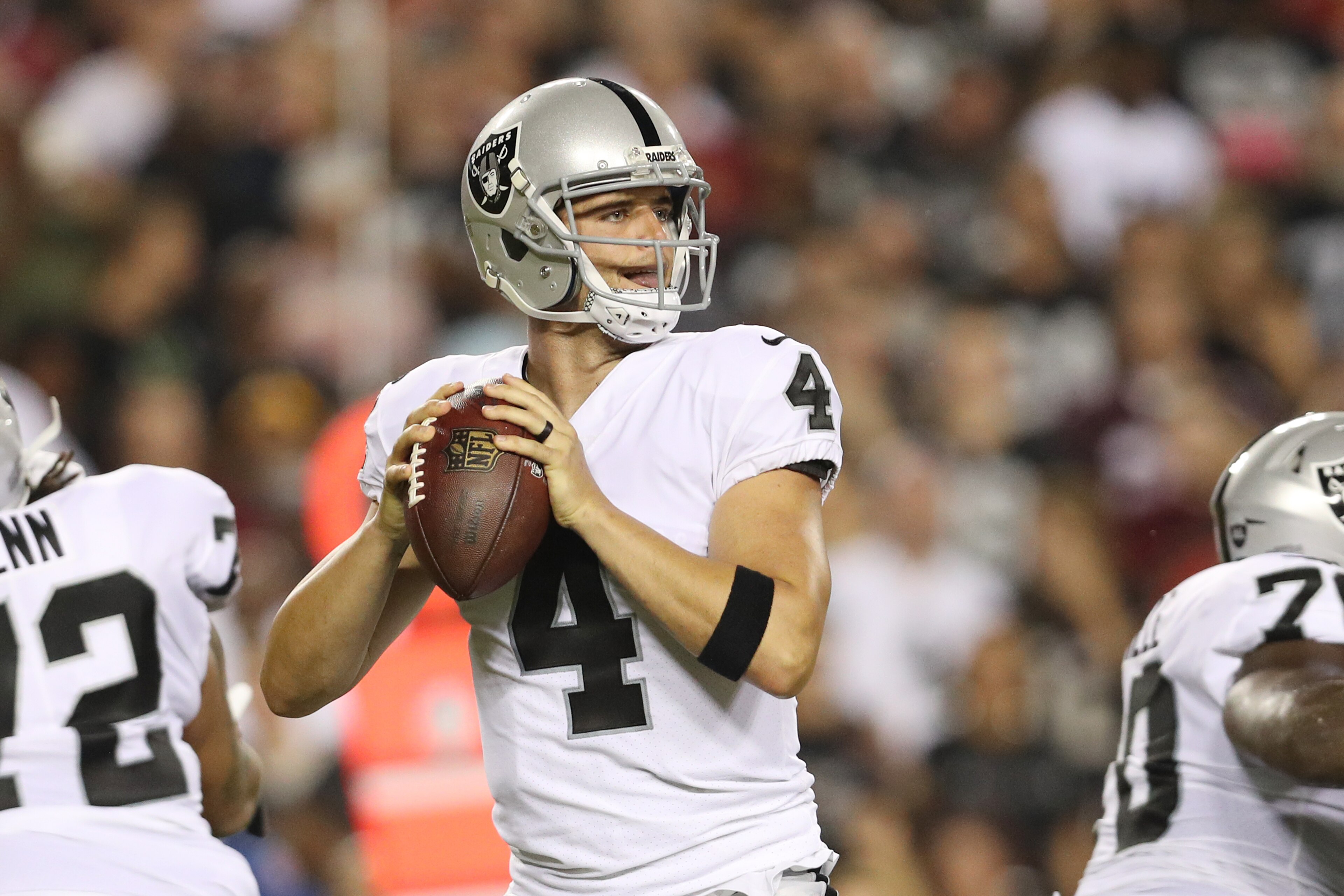 LANDOVER, MD - SEPTEMBER 24: Quarterback Derek Carr #4 of the Oakland Raiders throws in the first quarter of play against the Washington Redskins at FedExField on September 24, 2017 in Landover, Maryland. (Photo by Patrick Smith/Getty Images) LANDOVER, MD - SEPTEMBER 24: Quarterback Derek Carr #4 of the Oakland Raiders throws in the first quarter of play against the Washington Redskins at FedExField on September 24, 2017 in Landover, Maryland. (Photo by Patrick Smith/Getty Images)