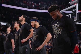 The Mavericks during the national anthem last season. “Every person has to decide for themselves,” owner Mark Cuban says of the evolving forms of protest and patriotism.