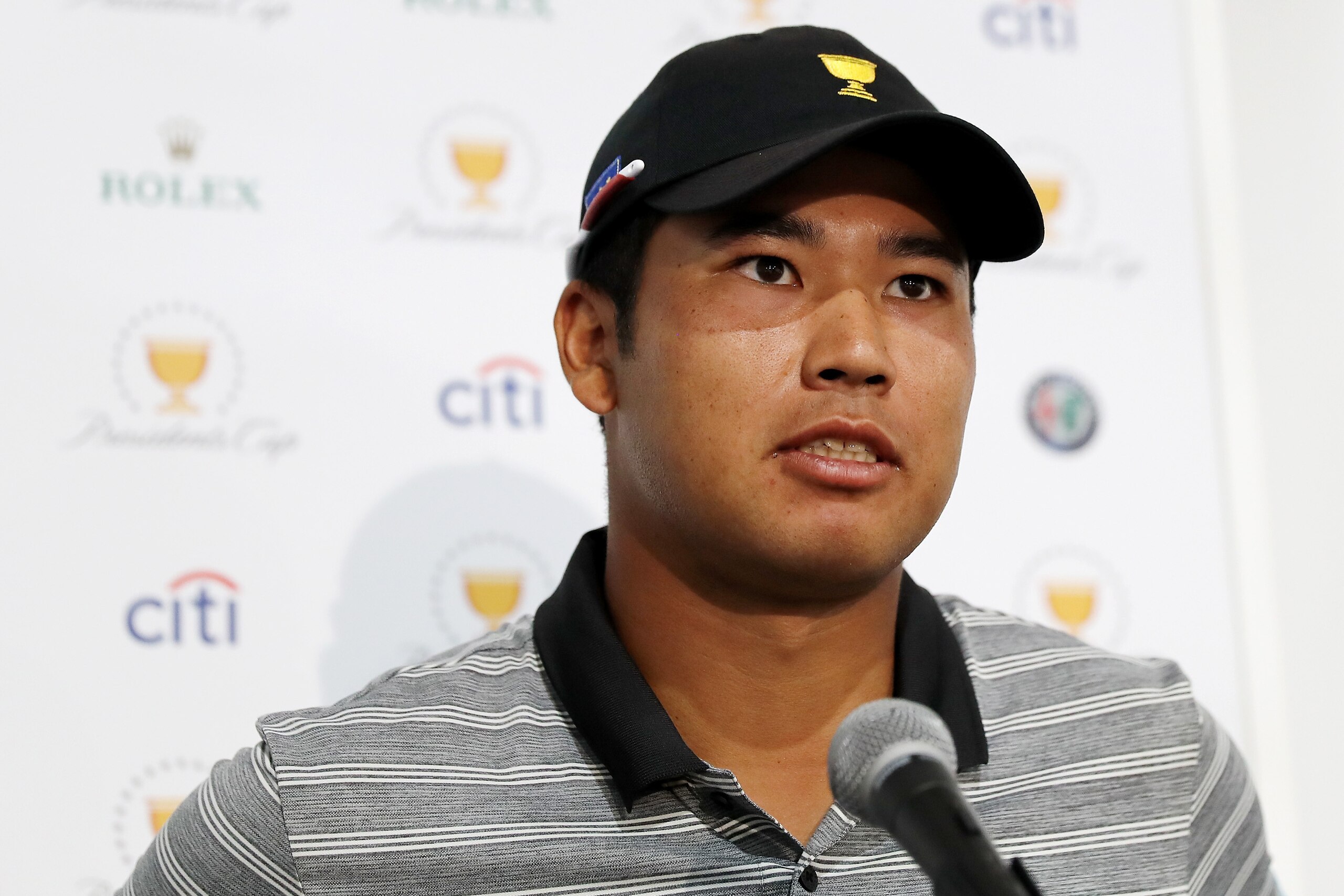 JERSEY CITY, NJ - SEPTEMBER 26: Hideki Matsuyama of the International team answers questions during a media availability after a practice round prior to the Presidents Cup on September 26, 2017 at Liberty National Golf Club in Jersey City, New Jersey. JERSEY CITY, NJ - SEPTEMBER 26: Hideki Matsuyama of the International team answers questions during a media availability after a practice round prior to the Presidents Cup on September 26, 2017 at Liberty National Golf Club in Jersey City, New Jersey.