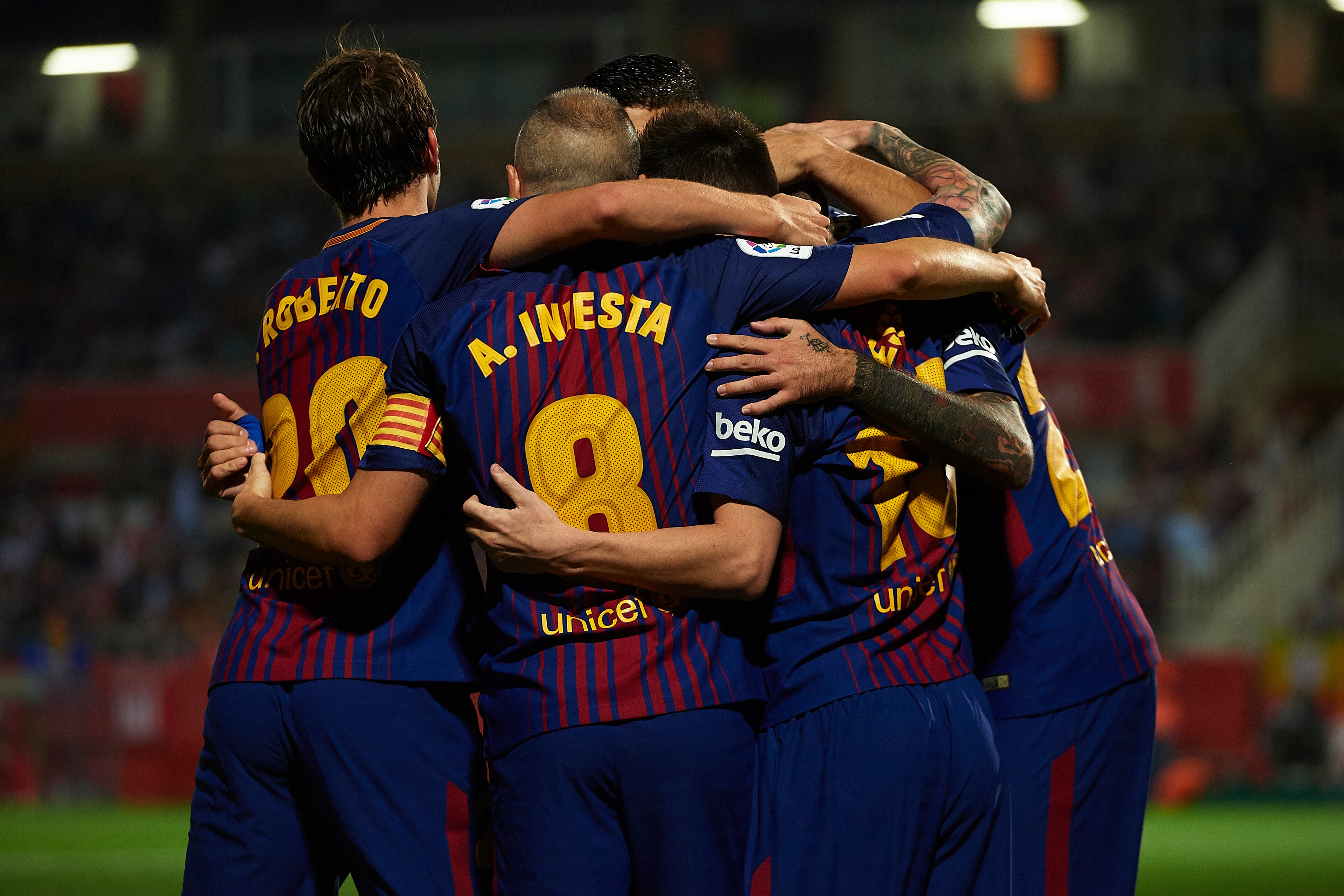 GIRONA, SPAIN - SEPTEMBER 23:  Luis Suarez of Barcelona celebrates scoring his team's second goal with his teammates during the La Liga match between Girona and Barcelona at Municipal de Montilivi Stadium on September 23, 2017 in Girona, Spain.  (Photo by