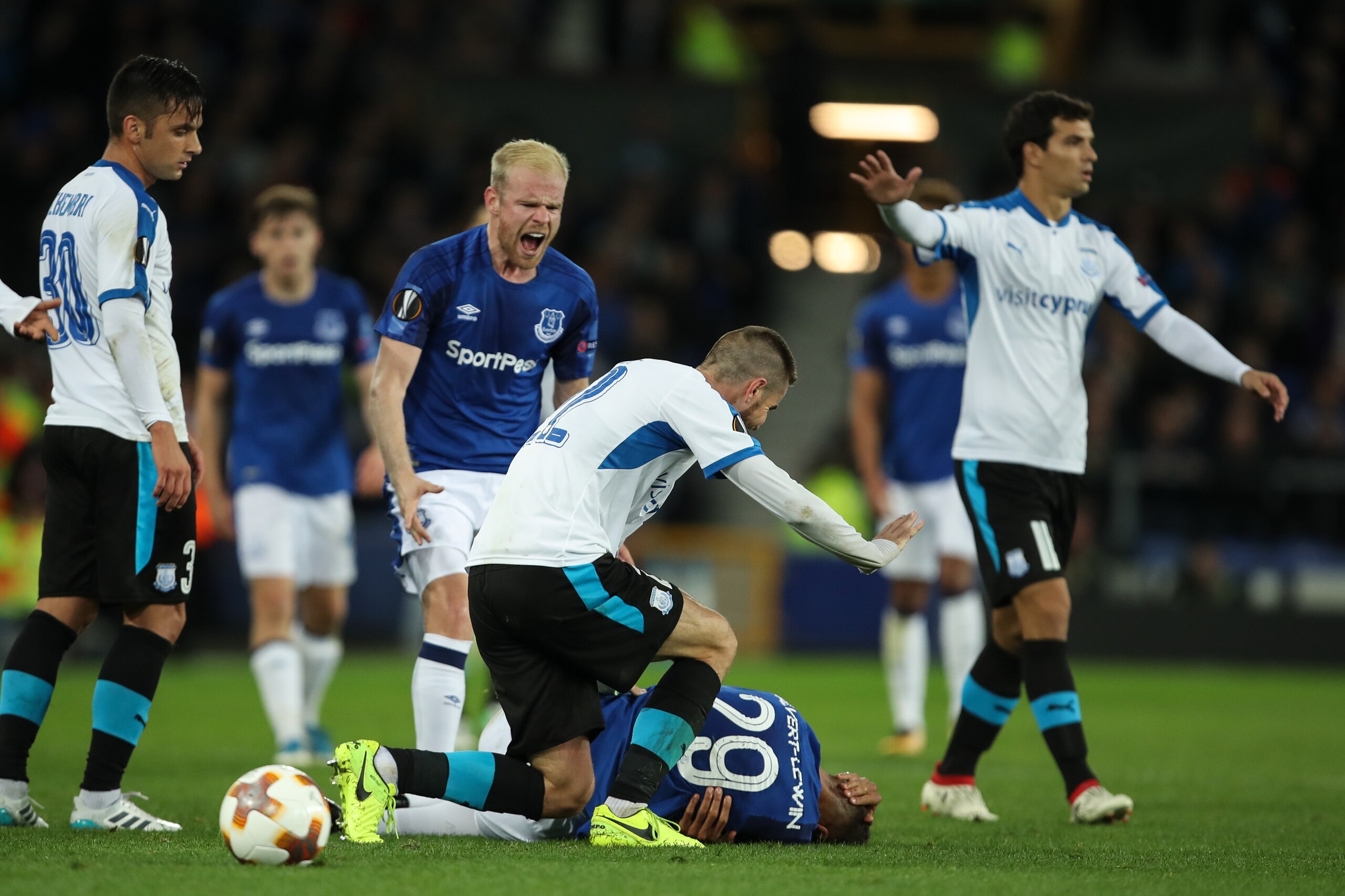 LIVERPOOL, ENGLAND - SEPTEMBER 28: Dominic Calvert-Lewin of Everton goes down after a challenge with Valentin Romberge of Apollon Limassol during the UEFA Europa League group E match between Everton FC and Apollon Limassol at Goodison Park on September 28