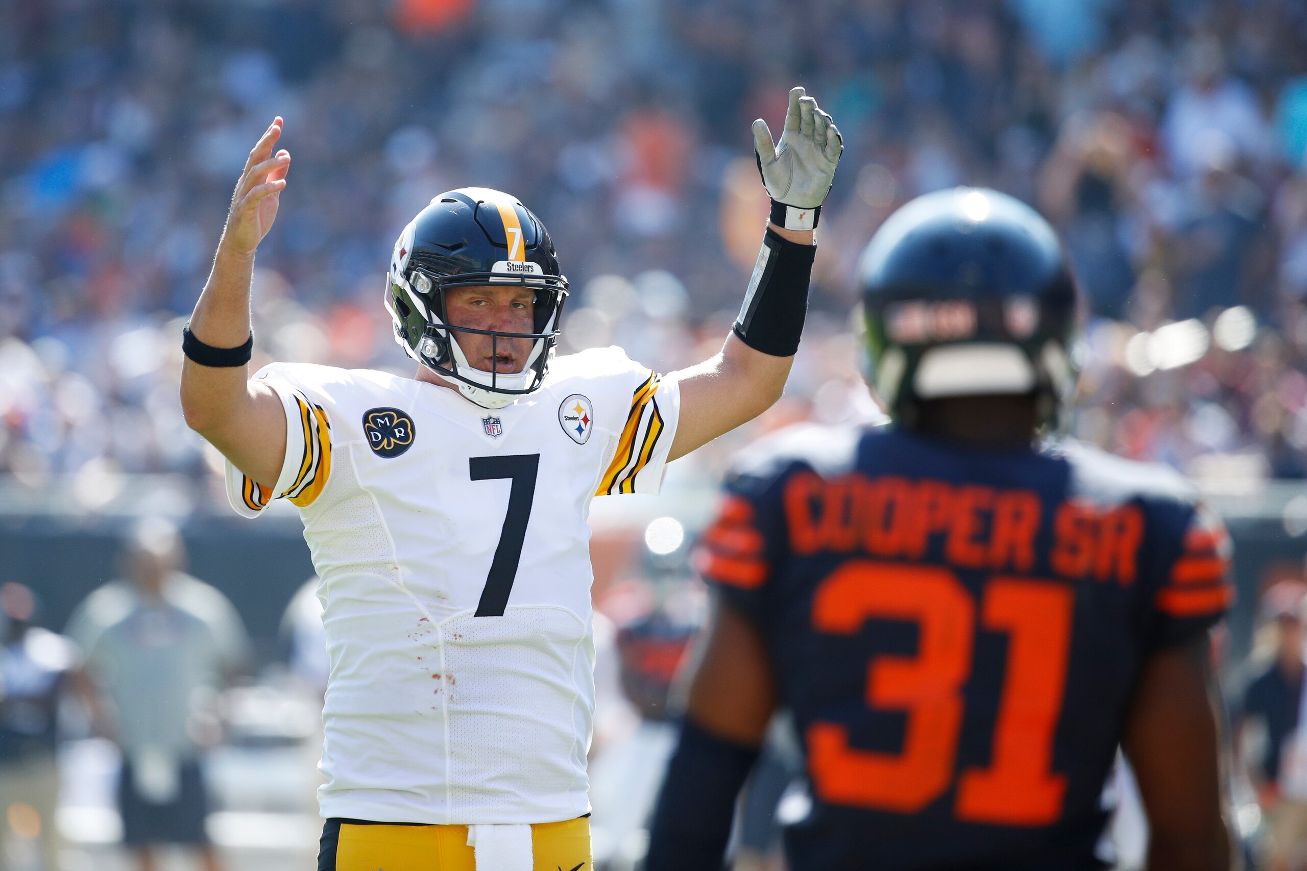 CHICAGO, IL - SEPTEMBER 24: Ben Roethlisberger #7 of the Pittsburgh Steelers raises his hands after a touchdown during a game against the Chicago Bears at Soldier Field on September 24, 2017 in Chicago, Illinois. The Bears won 23-17 in overtime. (Photo by