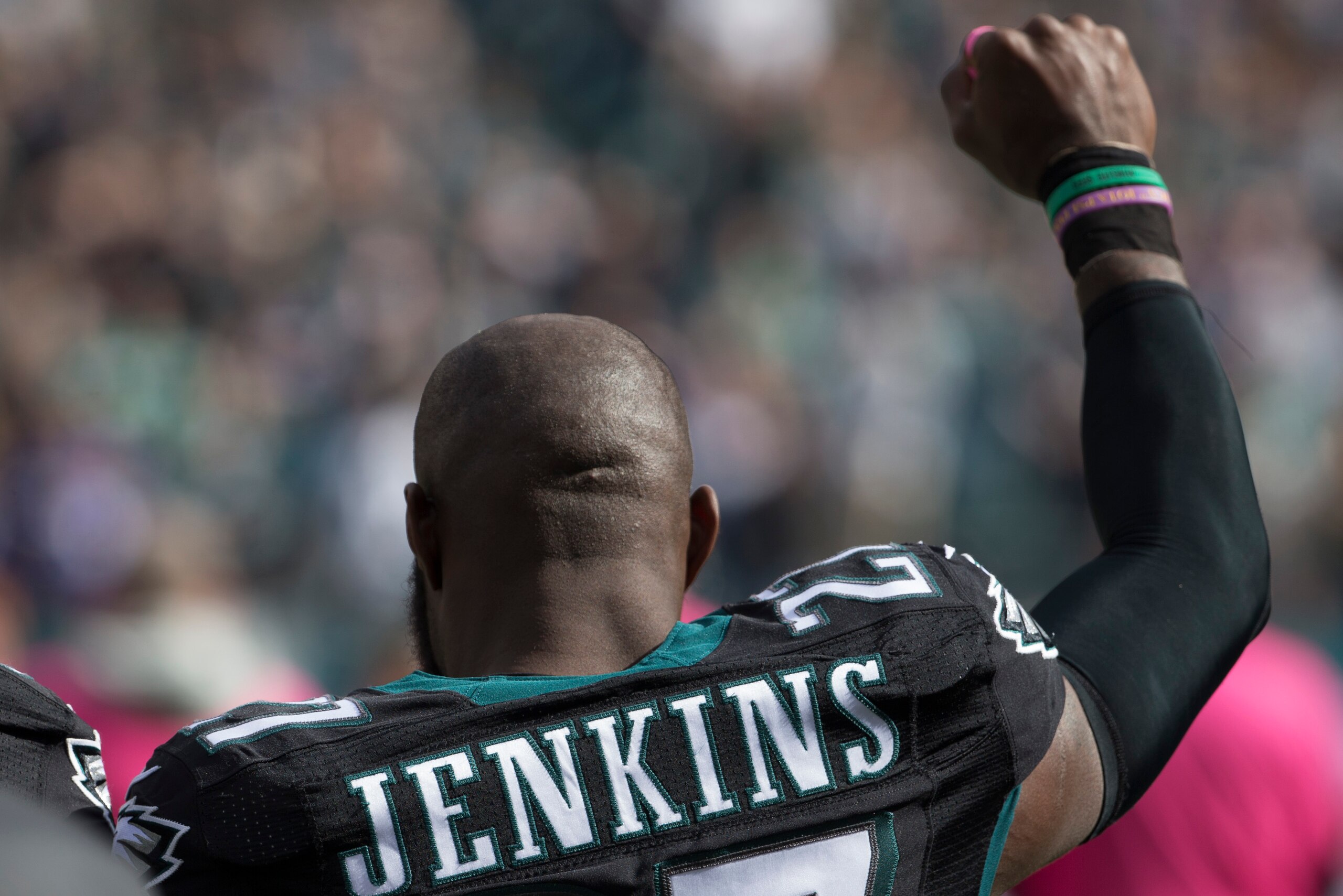 PHILADELPHIA, PA - OCTOBER 23: Malcolm Jenkins #27 of the Philadelphia Eagles holds up his fist during the national anthem prior to the game against the Minnesota Vikings at Lincoln Financial Field on October 23, 2016 in Philadelphia, Pennsylvania. The Ea PHILADELPHIA, PA - OCTOBER 23: Malcolm Jenkins #27 of the Philadelphia Eagles holds up his fist during the national anthem prior to the game against the Minnesota Vikings at Lincoln Financial Field on October 23, 2016 in Philadelphia, Pennsylvania. The Ea