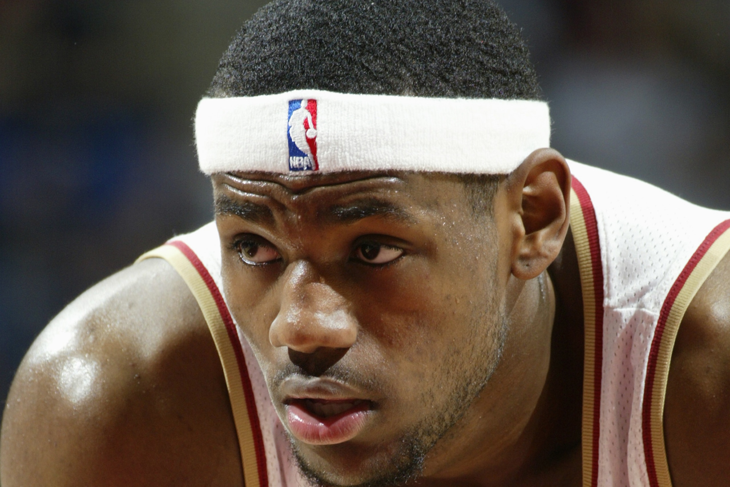 CLEVELAND - DECEMBER 26: LeBron James #23 of the Cleveland Cavaliers rests during the game against the Chicago Bulls at the Gund Arena on December 26, 2003 in Cleveland, Ohio. The Bulls won 87-80. NOTE TO USER: User expressly acknowledges and agrees t CLEVELAND - DECEMBER 26: LeBron James #23 of the Cleveland Cavaliers rests during the game against the Chicago Bulls at the Gund Arena on December 26, 2003 in Cleveland, Ohio. The Bulls won 87-80. NOTE TO USER: User expressly acknowledges and agrees t
