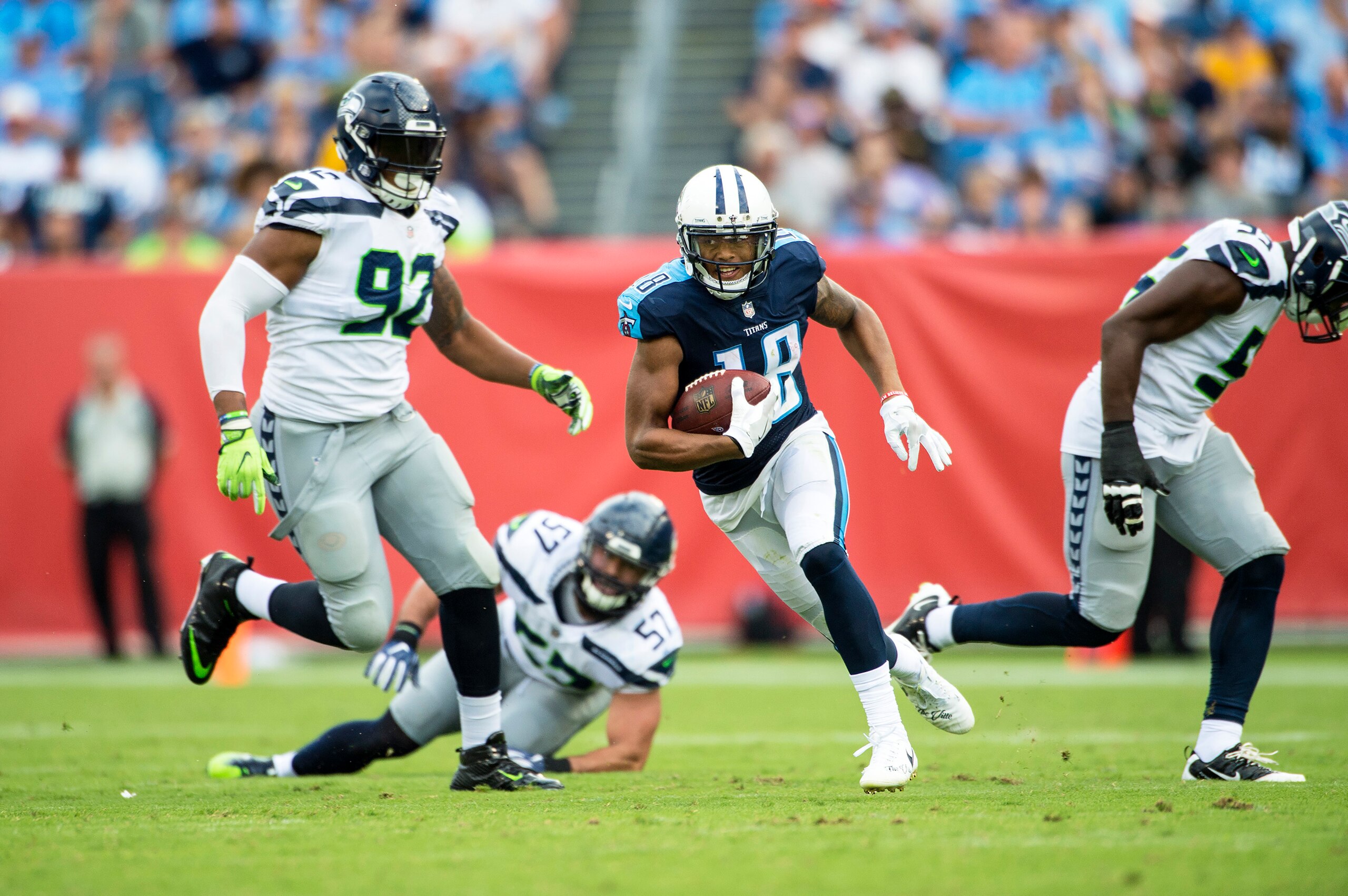 NASHVILLE, TN - SEPTEMBER 24:  Wide receiver Rishard Matthews #18 of the Tennessee Titans carries the ball during a NFL game against the Seattle Seahawks at Nissan Stadium on September 24, 2017 in Nashville, Tennessee.  (Photo by Ronald C. Modra/Sports Im
