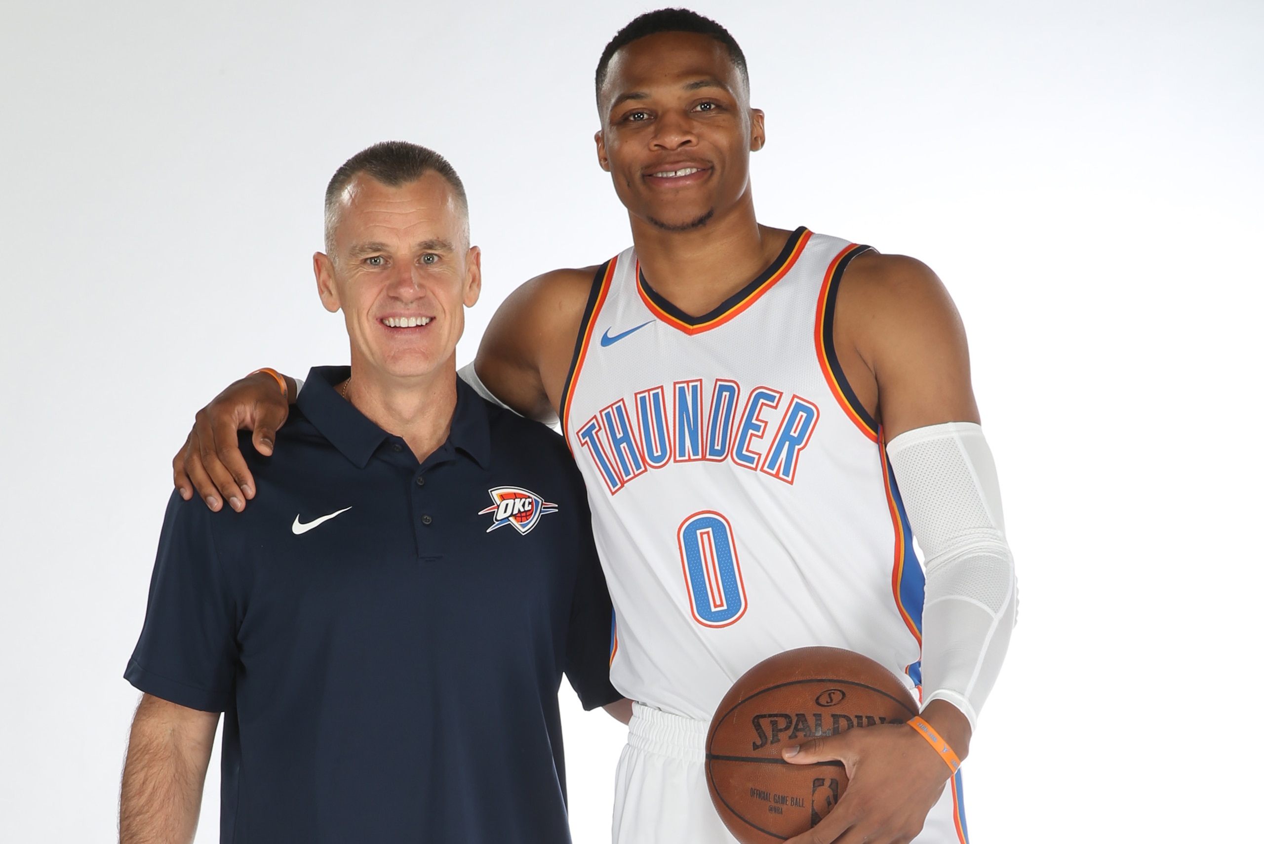 OKLAHOMA CITY, OK - SEPTEMBER 25: Head coach Billy Donovan and Russell Westbrook #0 of the Oklahoma City Thunder pose for a portrait during 2017 NBA Media Day on September 25, 2017 at the Chesapeake Energy Arena in Oklahoma City, Oklahoma. NOTE TO USER: U
