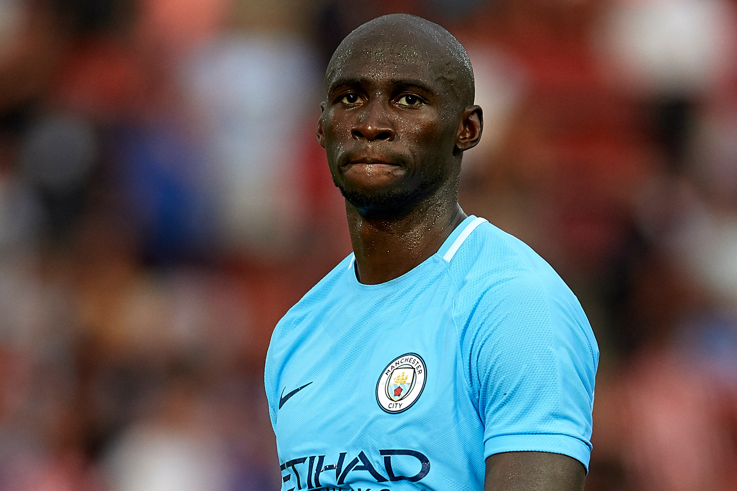 GIRONA, SPAIN - AUGUST 15:  Eliaquim Mangala of Manchester City looks on after the end the pre-season friendly match between Girona and Manchester City at Municipal de Montilivi Stadium on August 15, 2017 in Girona, Spain.  (Photo by Manuel Queimadelos Al