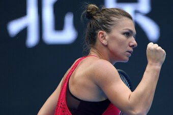 BEIJING, CHINA - SEPTEMBER 30:  Simona Halep of Romania reacts during the match against Alison Riske of the USA on day one of the 2017 China Open at the China National Tennis Centre on September 30, 2017 in Beijing, China.  (Photo by Emmanuel Wong/Getty I