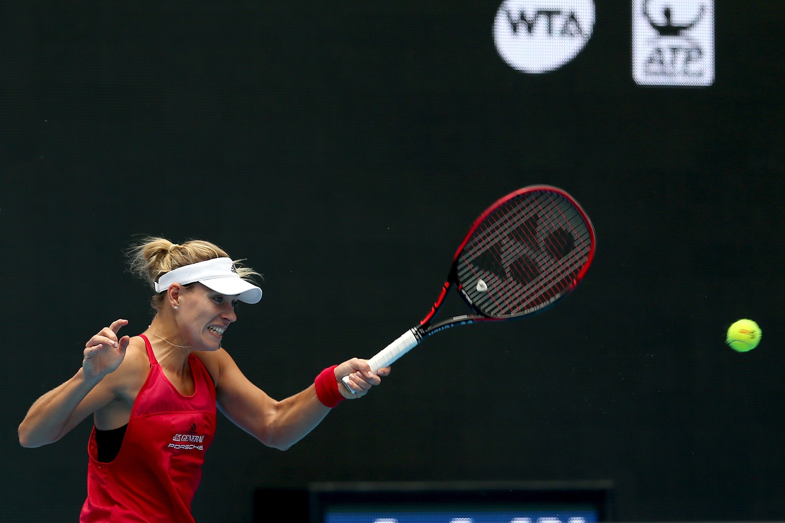 BEIJING, CHINA - SEPTEMBER 30:  Angelique Kerber of Germany returns a shot to Naomi Osaka of japan on day one of the 2017 China Open at the China National Tennis Centre on September 30, 2017 in Beijing, China.  (Photo by Emmanuel Wong/Getty Images)