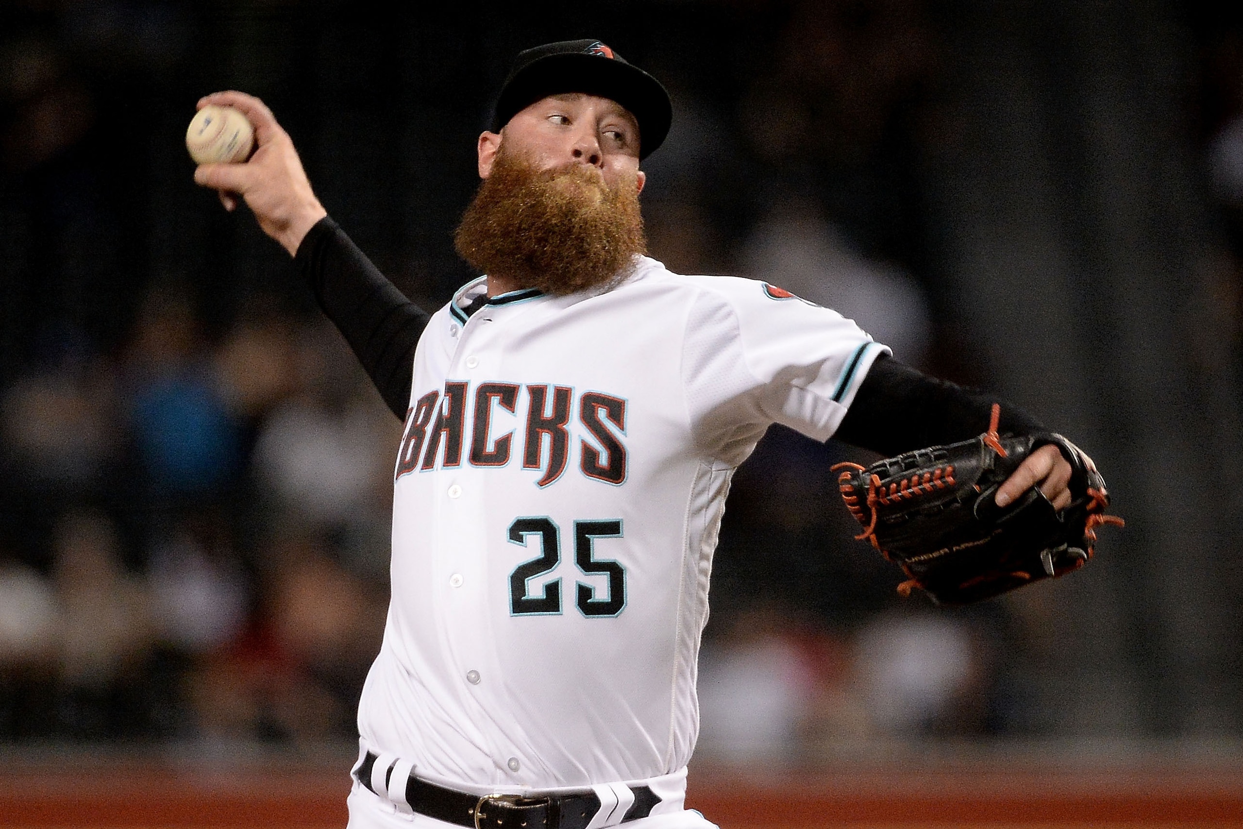 PHOENIX, AZ - SEPTEMBER 26:  Archie Bradley #25 of the Arizona Diamondbacks delivers a pitch in the eighth inning of the MLB game against the San Francisco Giants at Chase Field on September 26, 2017 in Phoenix, Arizona.  (Photo by Jennifer Stewart/Getty 