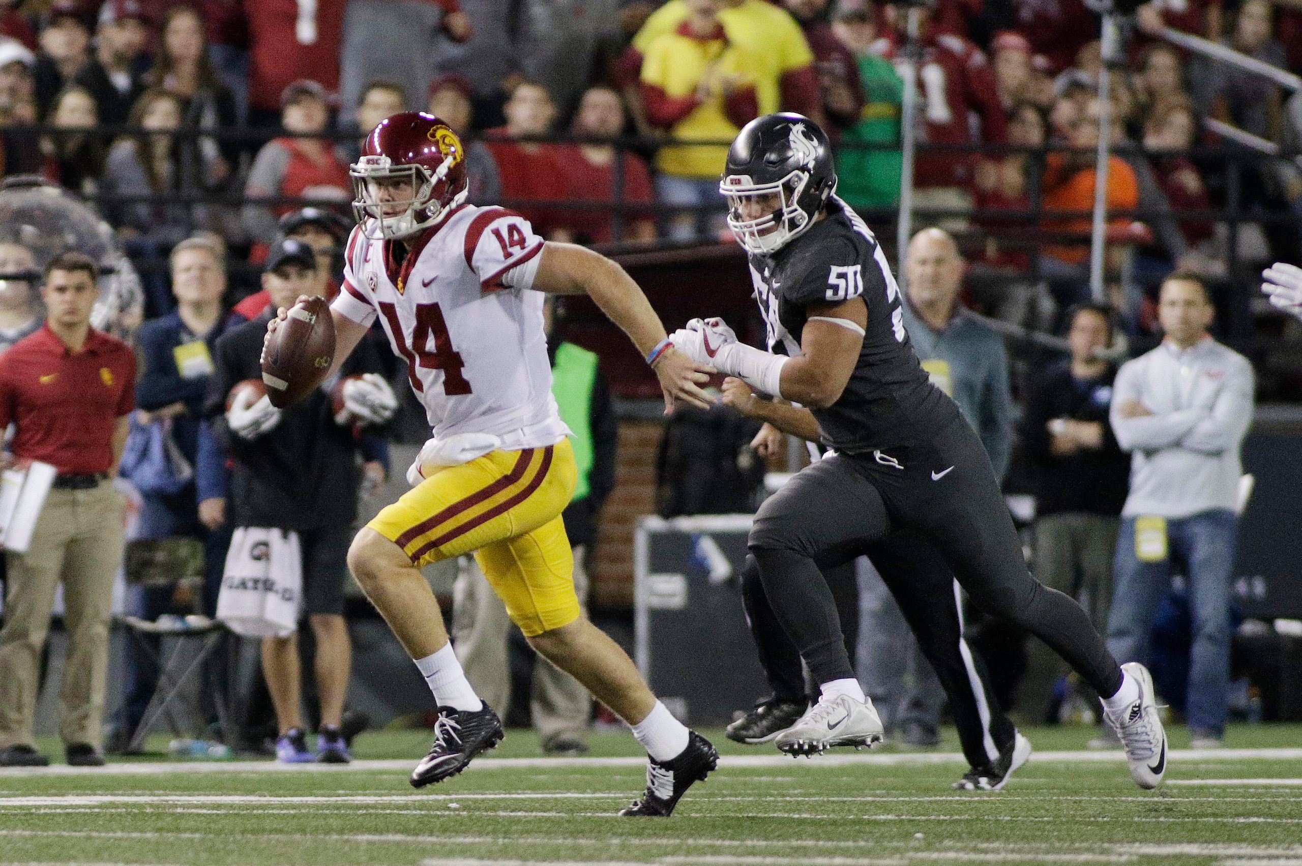 Sam Darnold spent plenty of time running for his life Friday night.