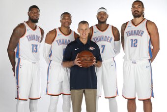 OKLAHOMA CITY, OK - SEPTEMBER 25: Paul George #13, Russell Westbrook #0 head coach Billy Donovan, Carmelo Anthony #7 and Steven Adams #12 of the Oklahoma City Thunder pose for a portrait during the 2017 NBA Media Day on September 25, 2017 at the Chesapeak