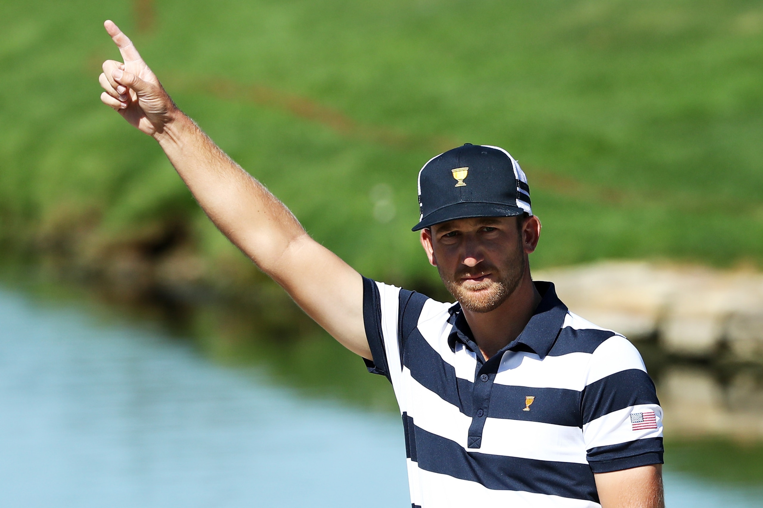 JERSEY CITY, NJ - OCTOBER 01:  Kevin Chappell of the U.S. Team celebrates after playing from the bunker for eagle on the second hole to go one up over Marc Leishman of Australia and the International Team during Sunday singles matches of the Presidents Cu