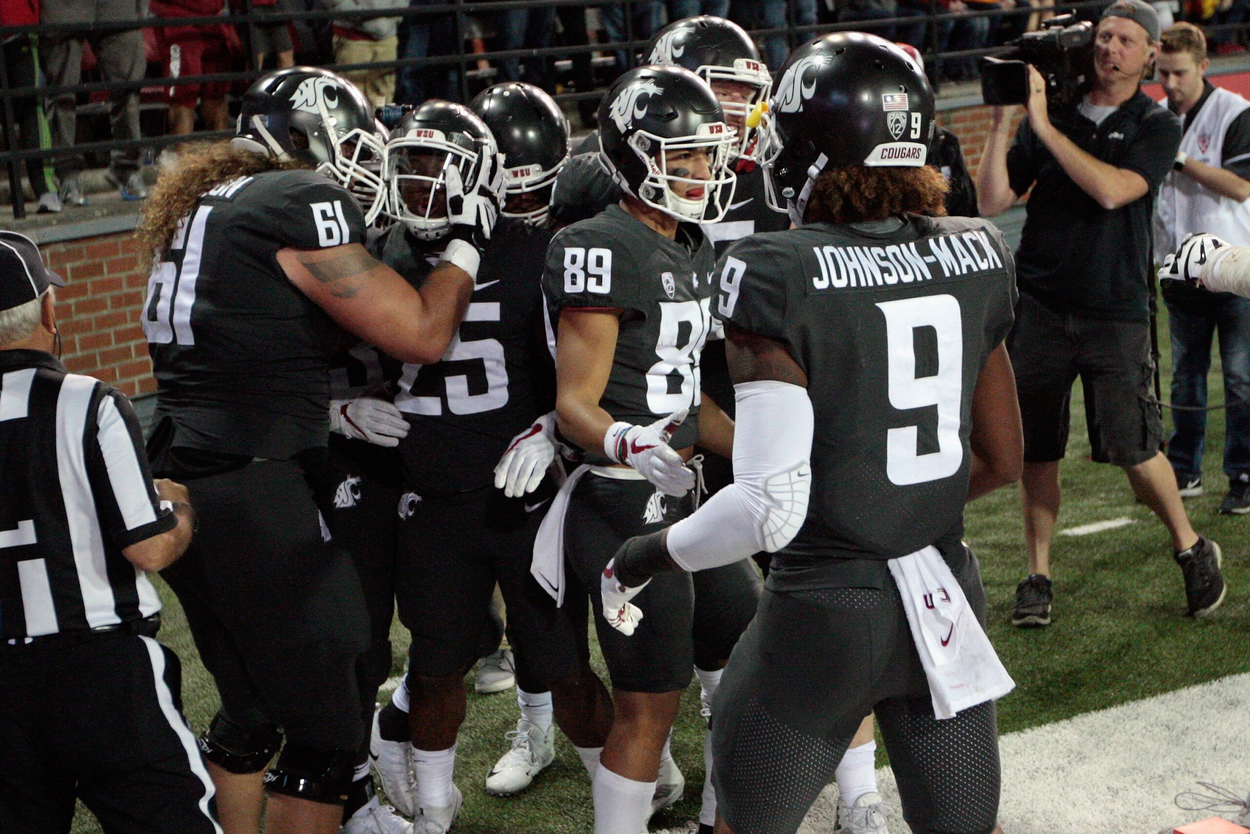 PULLMAN, WA - SEPTEMBER 29:  The Washington State Cougars celebrate with Jamal Morrow #25 after his touchdown in the second half of the game against the USC Trojans at Martin Stadium on September 29, 2017 in Pullman, Washington.  Washington State defeated