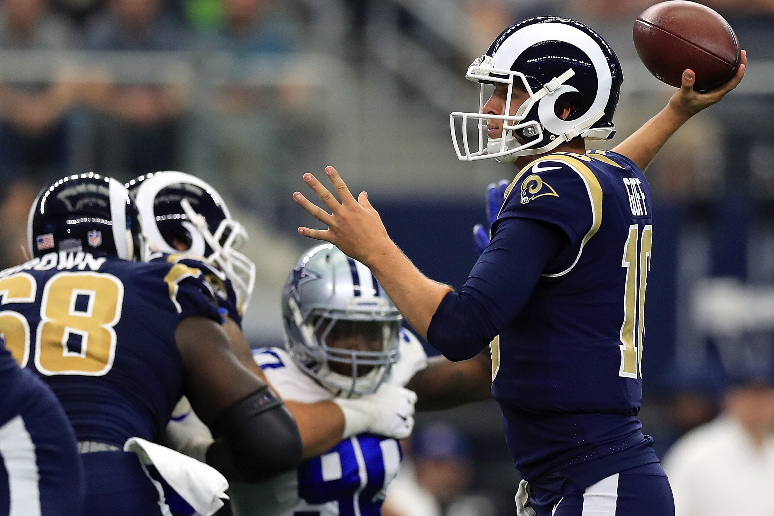 ARLINGTON, TX - OCTOBER 01:  Jared Goff #16 of the Los Angeles Rams throws against the Dallas Cowboys in the second quarter at AT&T Stadium on October 1, 2017 in Arlington, Texas.  (Photo by Ronald Martinez/Getty Images)