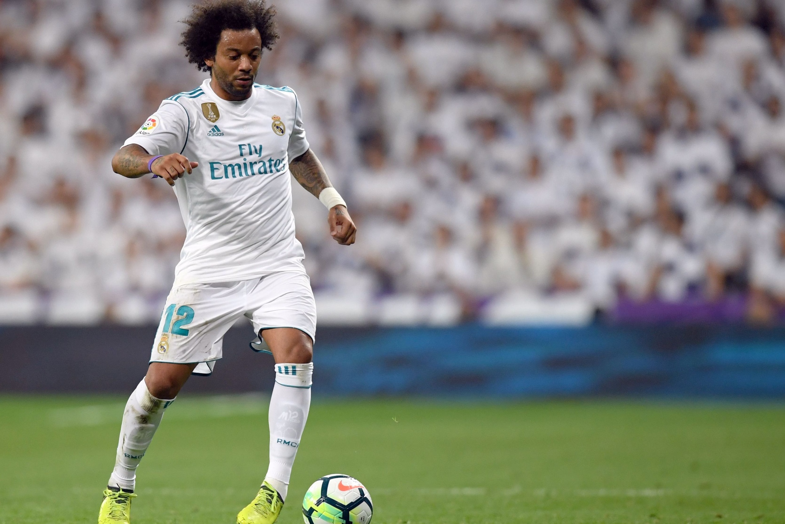 Real Madrid's defender from Brazil Marcelo controls the ball during the Spanish league football match Real Madrid CF against Real Betis  at the Santiago Bernabeu stadium in Madrid on September 20, 2017. / AFP PHOTO / GABRIEL BOUYS        (Photo credit sho