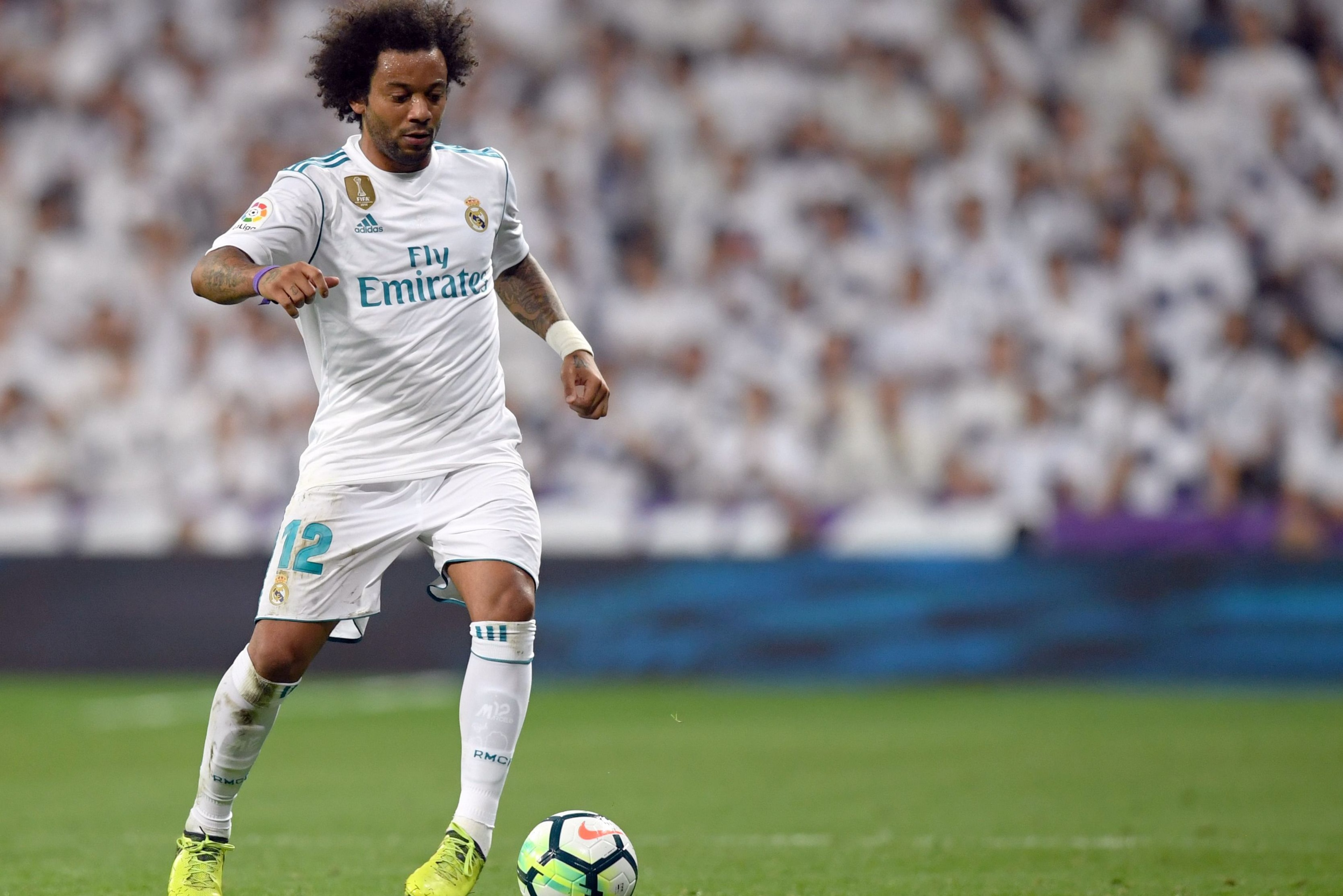 Real Madrid's defender from Brazil Marcelo controls the ball during the Spanish league football match Real Madrid CF against Real Betis  at the Santiago Bernabeu stadium in Madrid on September 20, 2017. / AFP PHOTO / GABRIEL BOUYS        (Photo credit sho
