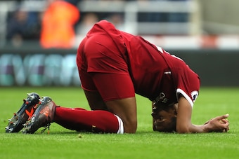 NEWCASTLE UPON TYNE, ENGLAND - OCTOBER 01:  Joel Matip of Liverpool reacts after Newcastle's first goal during the Premier League match between Newcastle United and Liverpool at St. James' Park on October 1, 2017 in Newcastle upon Tyne, England.  (Photo b