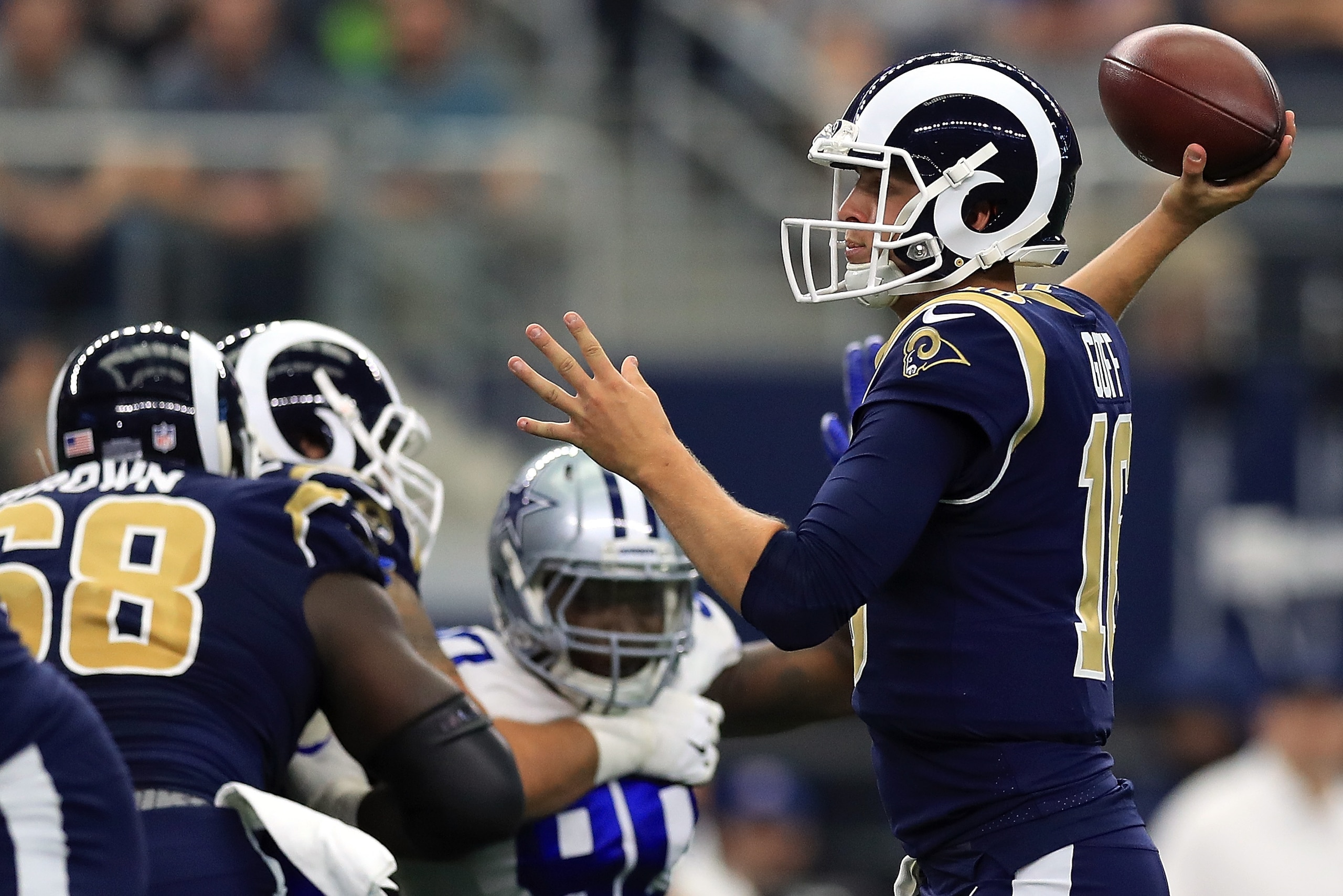 ARLINGTON, TX - OCTOBER 01:  Jared Goff #16 of the Los Angeles Rams throws against the Dallas Cowboys in the second quarter at AT&T Stadium on October 1, 2017 in Arlington, Texas.  (Photo by Ronald Martinez/Getty Images)