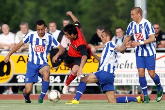 Jerome Kiesewetter (left) plays alongside John Brooks (second, right). Both come from U.S. military families.