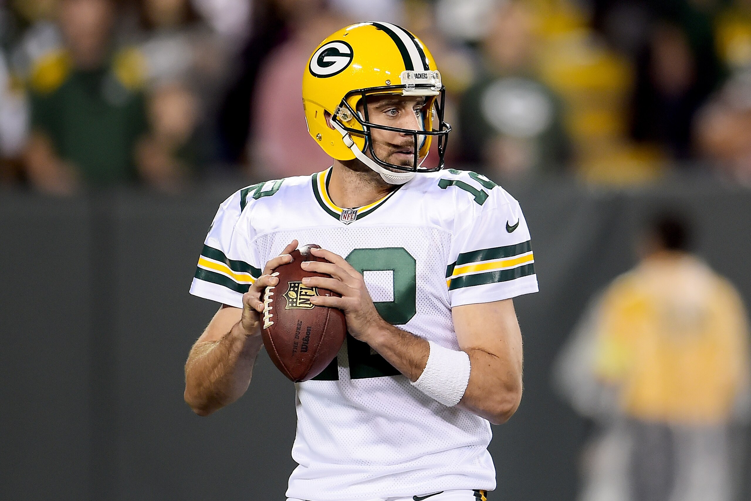 GREEN BAY, WI - SEPTEMBER 28:  Aaron Rodgers #12 of the Green Bay Packers drops back to pass in the second quarter against the Chicago Bears at Lambeau Field on September 28, 2017 in Green Bay, Wisconsin. (Photo by Stacy Revere/Getty Images)
