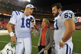 LANDOVER, MD - OCTOBER 17:  Peyton Manning #18 of the Indianapolis Colts is interviewed along with Jeff Saturday #63 after the game against the Washington Redskins at FedExField on October 17, 2010 in Landover, Maryland. The Colts defeated the Redskins 27