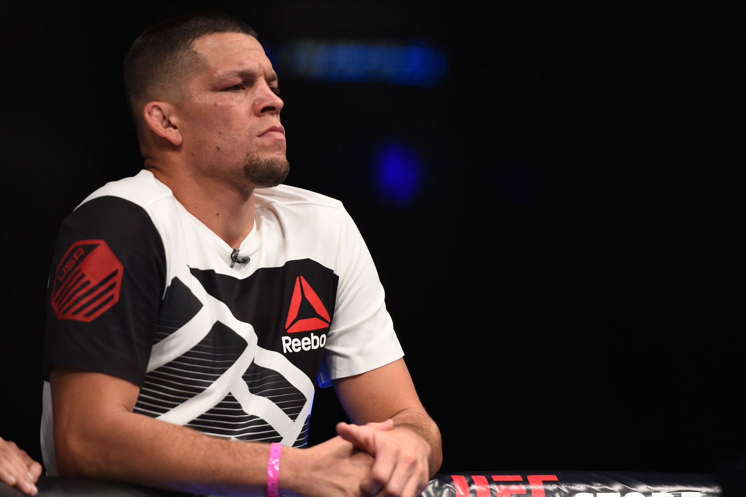 MEXICO CITY, MEXICO - NOVEMBER 05:  Nate Diaz watches as teammate Chris Avila of the United States enters the Octagon before facing Enrique Barzola of Peru in their featherweight bout during the UFC Fight Night event at Arena Ciudad de Mexico on November 