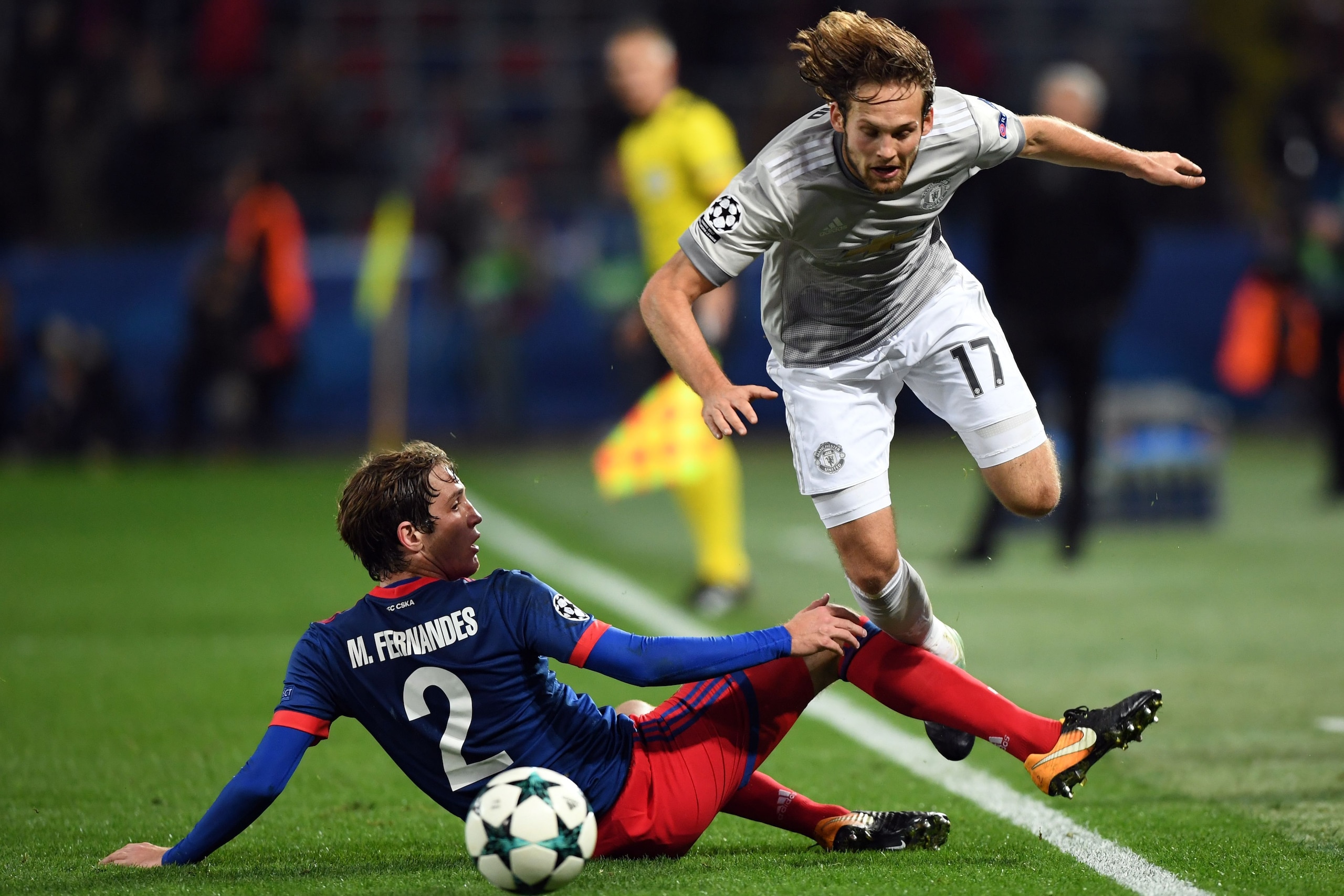 CSKA Moscow's defender from Russia Mario Fernandes and Manchester United's defender from Netherlands Daley Blind vie for the ball during the UEFA Champions League Group A football match between PFC CSKA Moscow and Manchester United FC in Moscow on Septemb