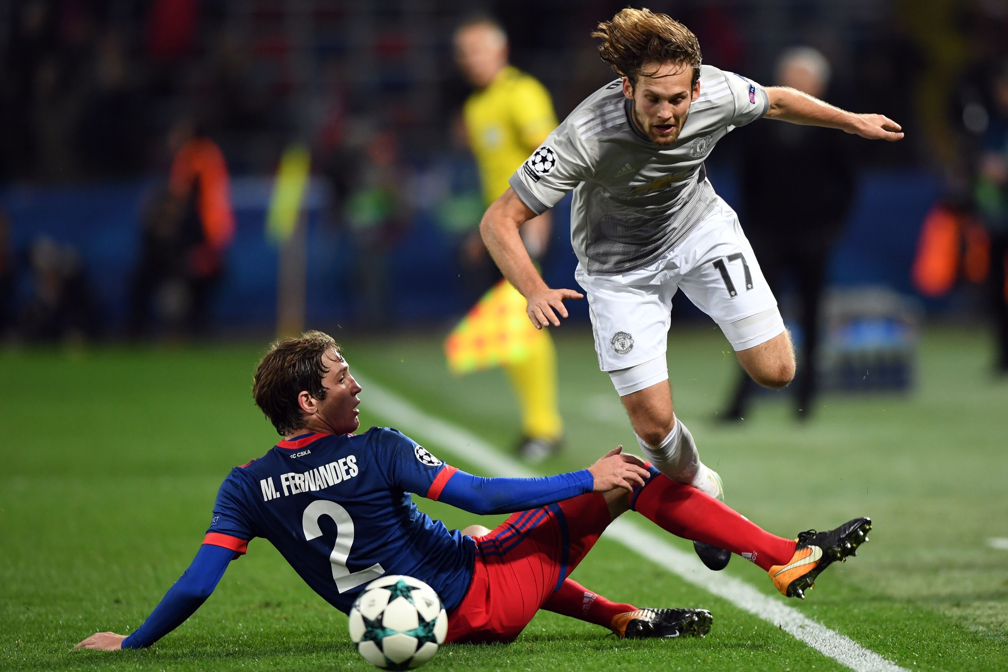 CSKA Moscow's defender from Russia Mario Fernandes and Manchester United's defender from Netherlands Daley Blind vie for the ball during the UEFA Champions League Group A football match between PFC CSKA Moscow and Manchester United FC in Moscow on Septemb