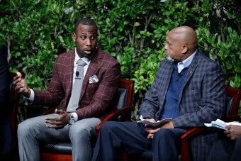 Anquan Boldin (left) speaks at a sports and activism panel in San Jose, California in January with former U.S. olympian Tommie Smith (right).
