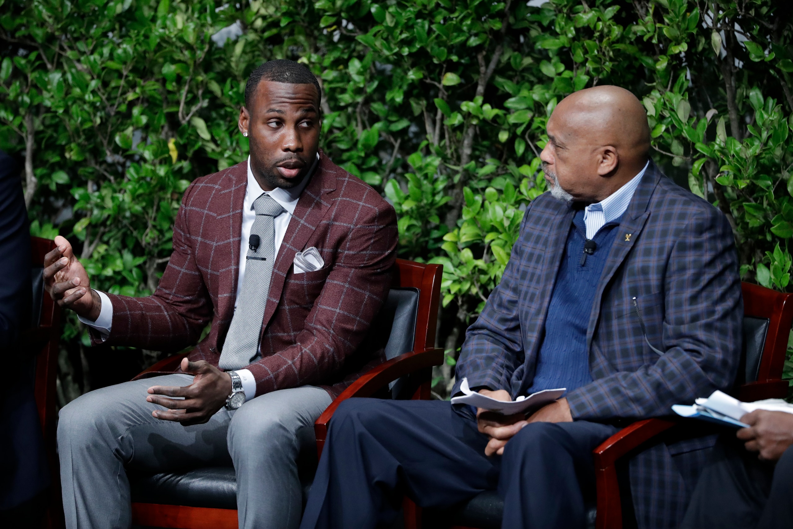 Anquan Boldin (left) speaks at a sports and activism panel in San Jose, California in January with former U.S. olympian Tommie Smith (right).
