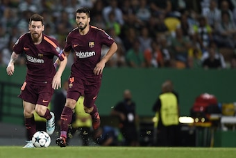 LISBON, PORTUGAL - SEPTEMBER 27: Lionel Messi and Luis Suarez of FC Barcelona during the UEFA Champions League group D match between Sporting CP and FC Barcelona at Estadio Jose Alvalade on September 27, 2017 in Lisbon, Portugal. (Photo by Octavio Passos/