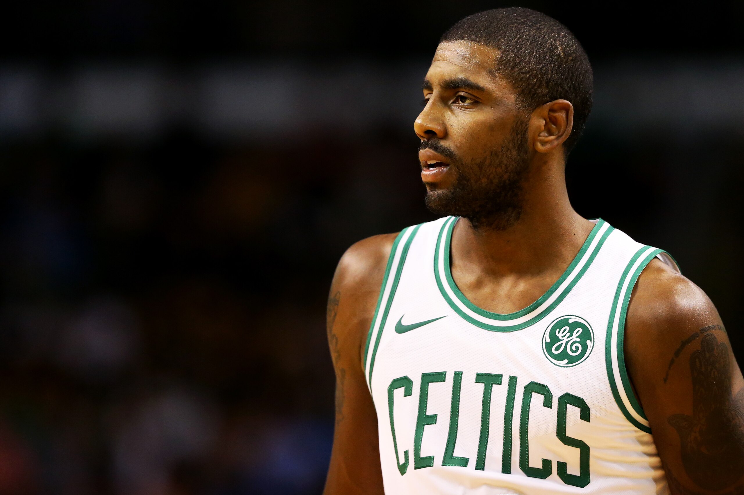 BOSTON, MA - OCTOBER 2: Kyrie Irving #11 of the Boston Celtics looks on during the first half against the Charlotte Hornets at TD Garden on October 2, 2017 in Boston, Massachusetts. NOTE TO USER: User expressly acknowledges and agrees that, by downloading