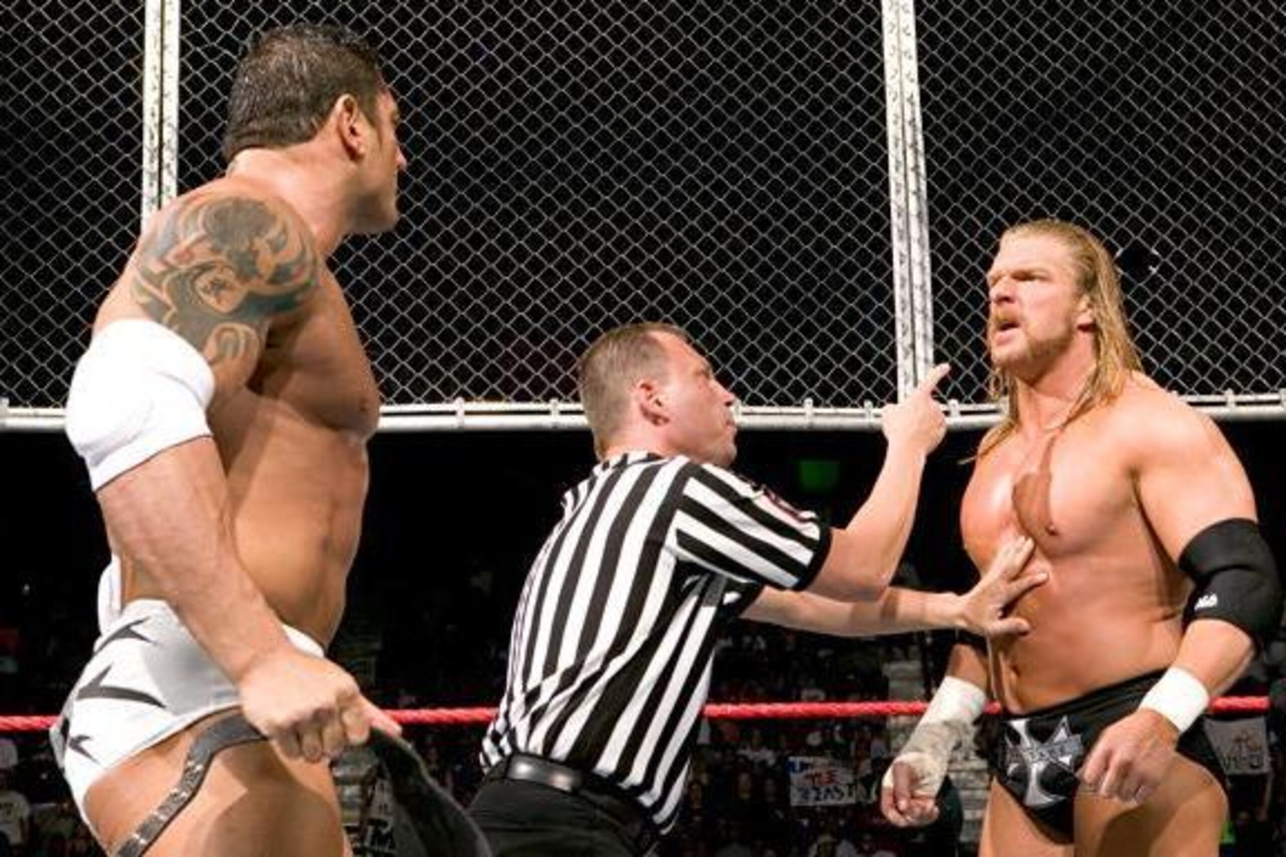 Batista and Triple H square off in Hell in a Cell in 2005.