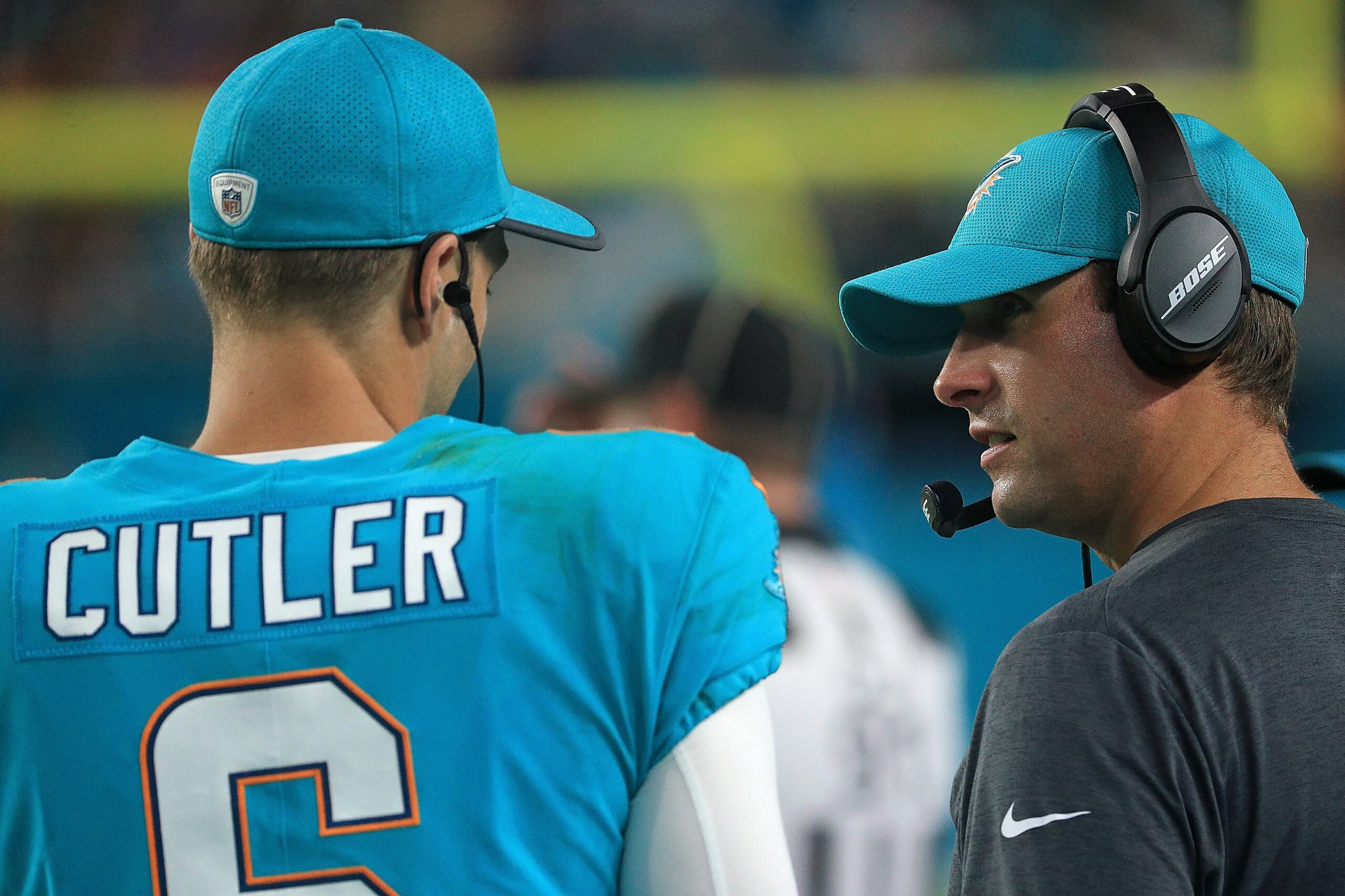 MIAMI GARDENS, FL - AUGUST 17:  Jay Cutler #6 of the Miami Dolphins talks with head coach Adam Gase during a preseason game against the Baltimore Ravens at Hard Rock Stadium on August 17, 2017 in Miami Gardens, Florida.  (Photo by Mike Ehrmann/Getty Image