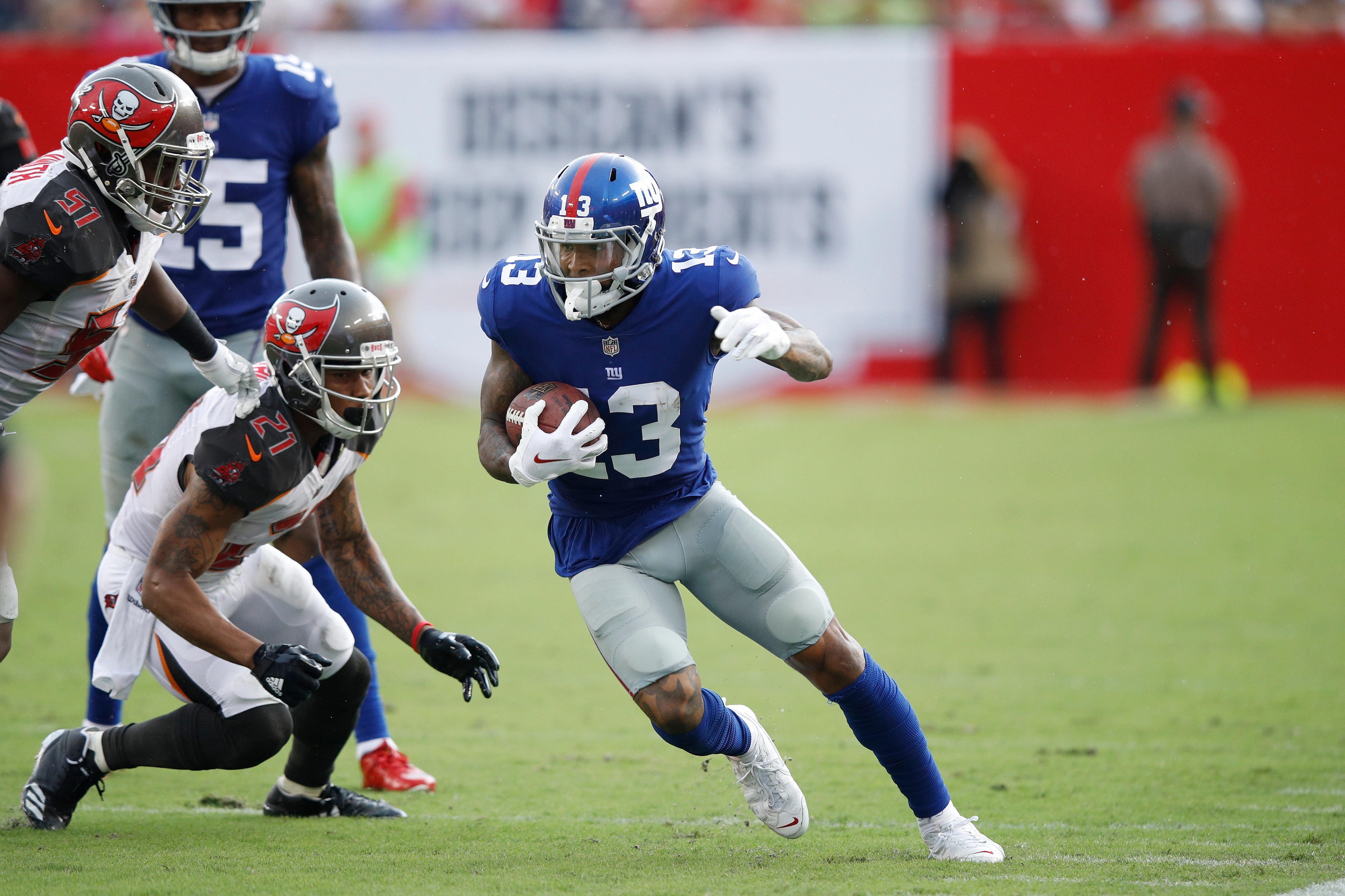 TAMPA, FL - OCTOBER 01: Odell Beckham Jr. #13 of the New York Giants runs after a catch during a game against the Tampa Bay Buccaneers at Raymond James Stadium on October 1, 2017 in Tampa, Florida. The Bucs defeated the Giants 25-23. (Photo by Joe Robbins