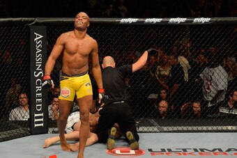 LAS VEGAS, NV - JULY 7:   Anderson Silva reacts after knocking out Chael Sonnen during their UFC middleweight championship bout at UFC 148 inside MGM Grand Garden Arena on July 7, 2012 in Las Vegas, Nevada.  (Photo by Donald Miralle/Zuffa LLC/Zuffa LLC vi
