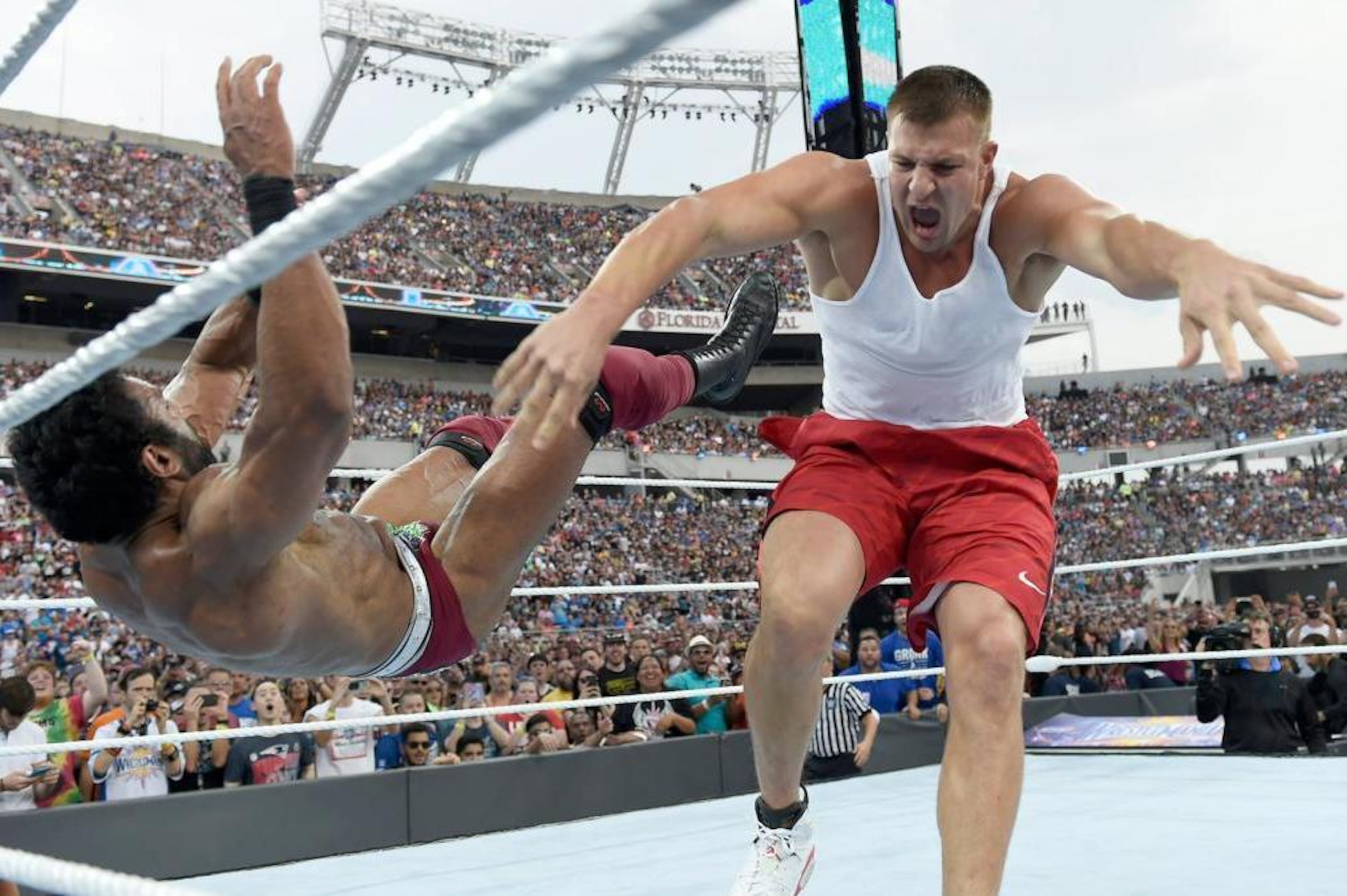 Rob Gronkowski takes down Jinder Mahal at WrestleMania 33. Rob Gronkowski takes down Jinder Mahal at WrestleMania 33.