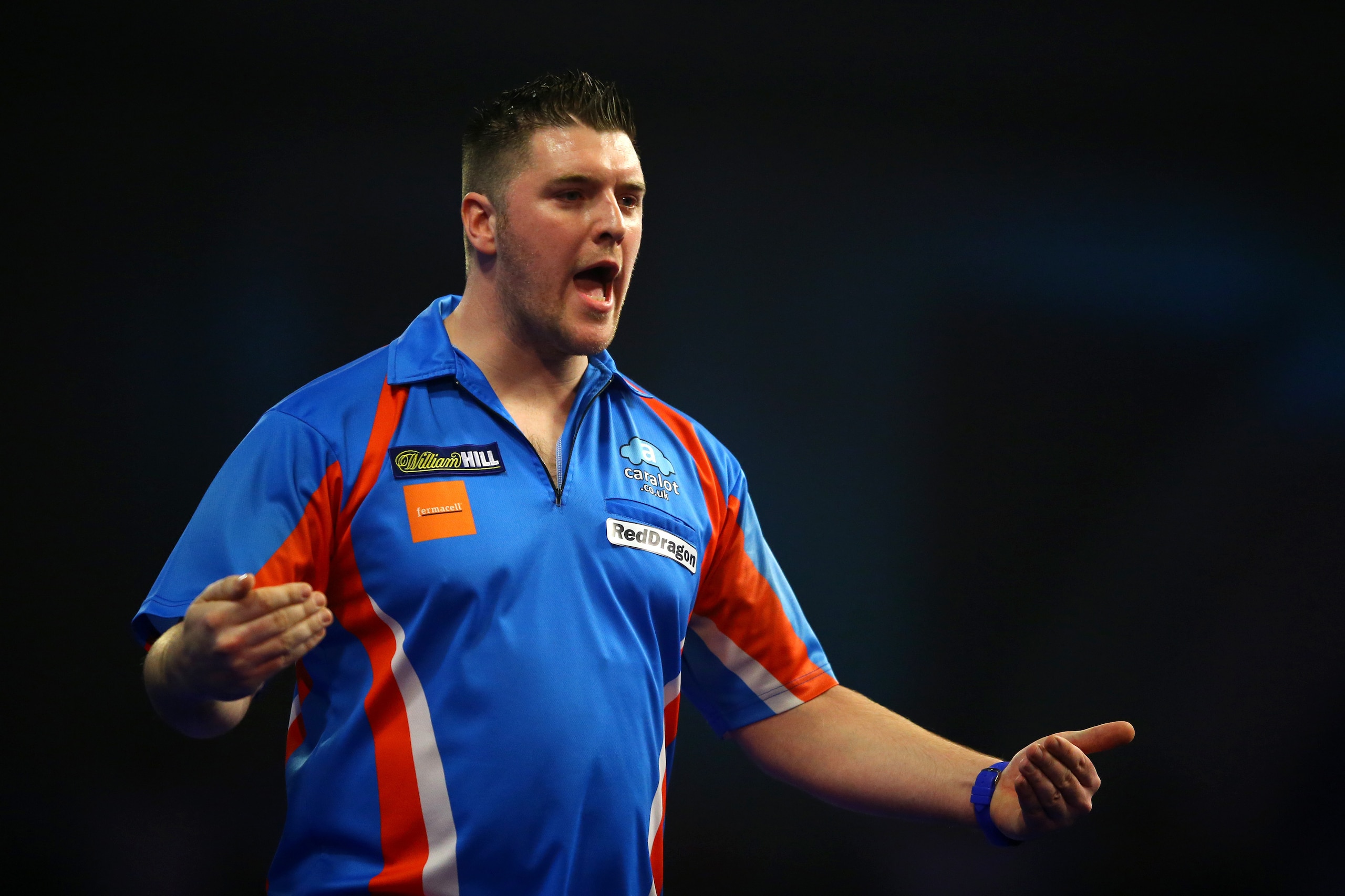 LONDON, ENGLAND - DECEMBER 17:  Daryl Gurney celebrates victory over Jamie Lewis during the first round on day one of the 2016 William Hill PDC World Darts Championships at Alexandra Palace on December 17, 2015 in London, England.  (Photo by Richard Heath