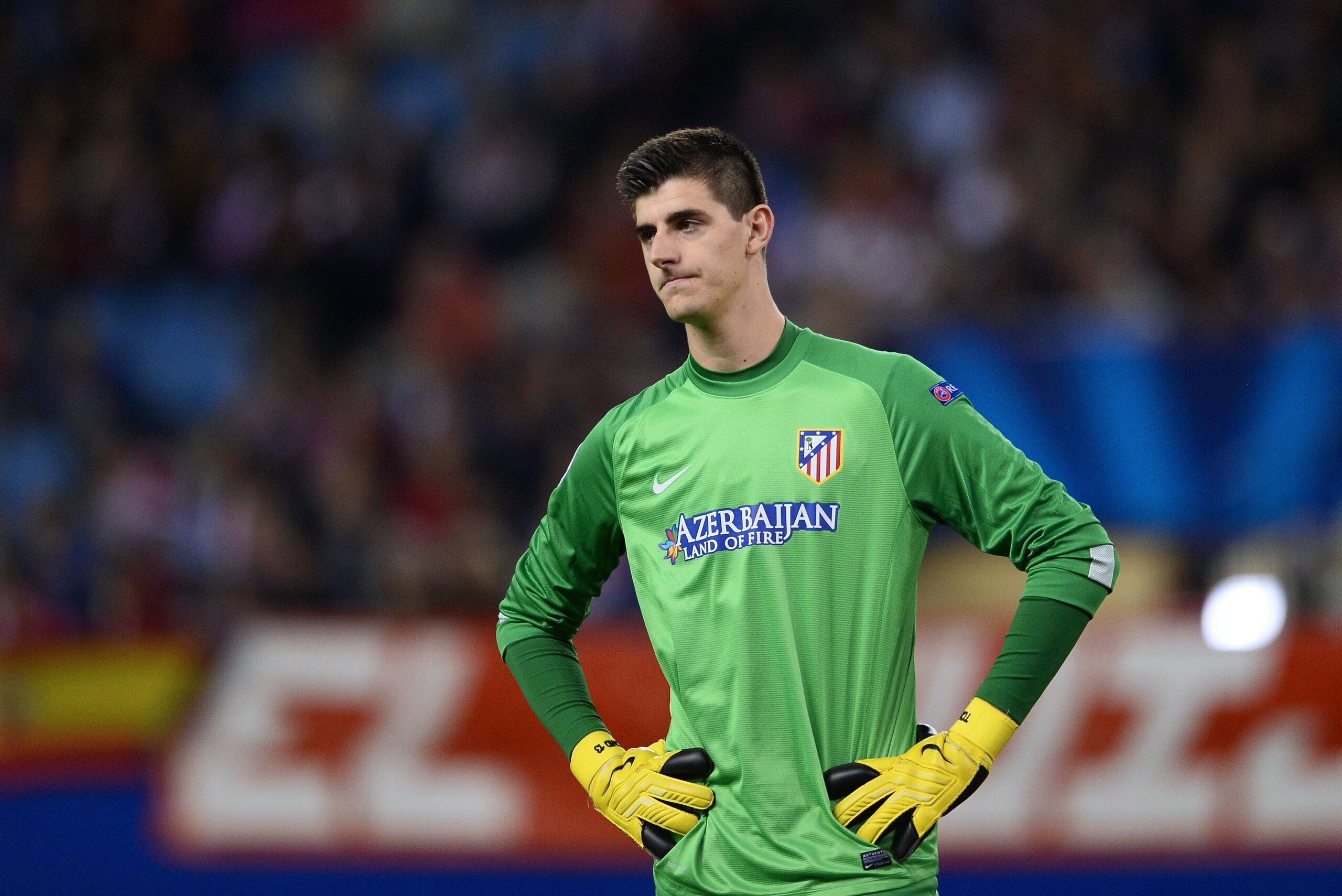 Atletico Madrid's Belgian goalkeeper Thibaut Courtois gestures during the the UEFA Champions League  football match Club Atletico de Madrid vs Austria Wien on November 6, 2013 at the Vicente Calderon stadium in Madrid.  AFP PHOTO / PIERRE-PHILIPPE MARCOU 