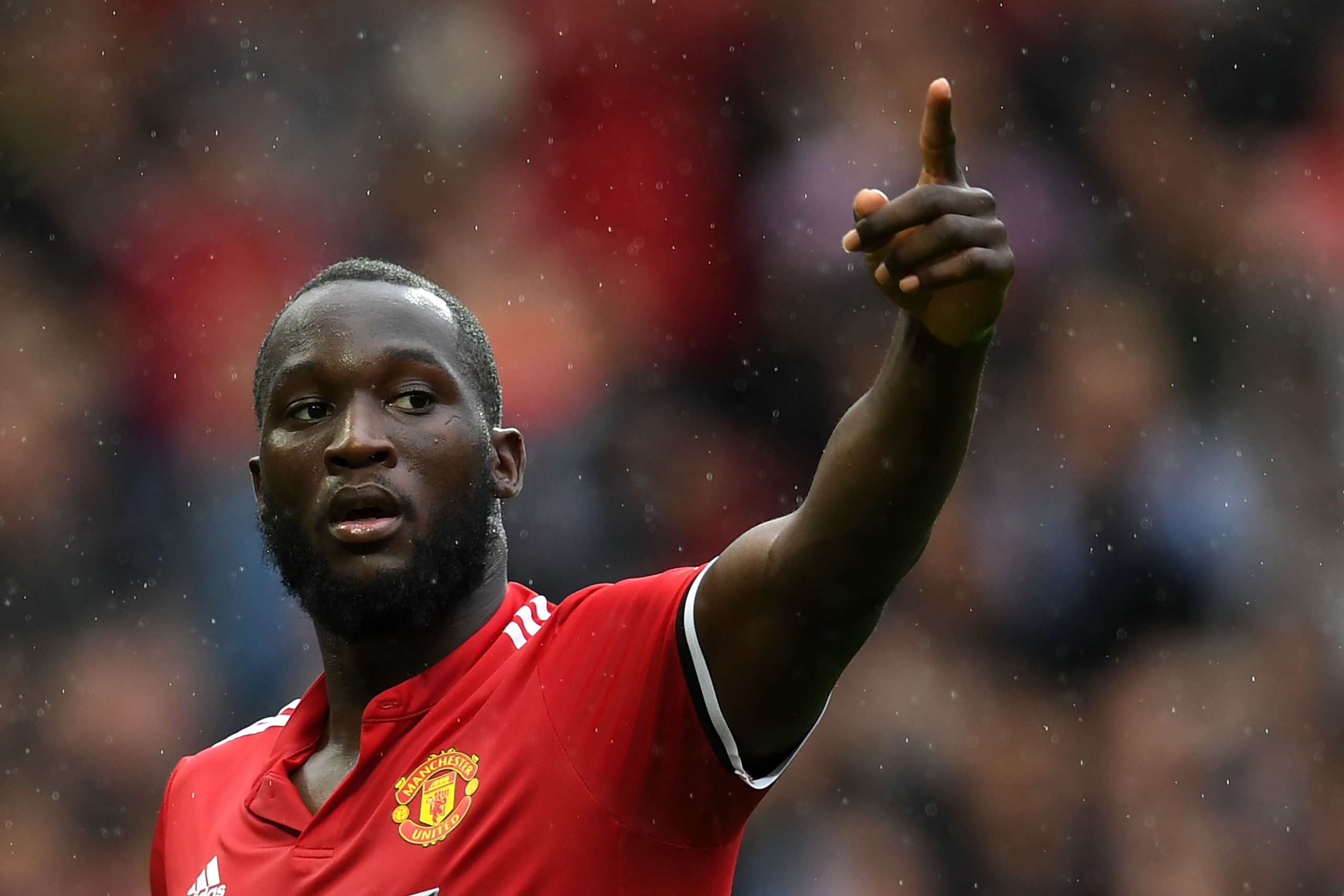 Manchester United's Belgian striker Romelu Lukaku celebrates scoring the team's fourth goal during the English Premier League football match between Manchester United and Crystal Palace at Old Trafford in Manchester, north west England, on September 30, 2