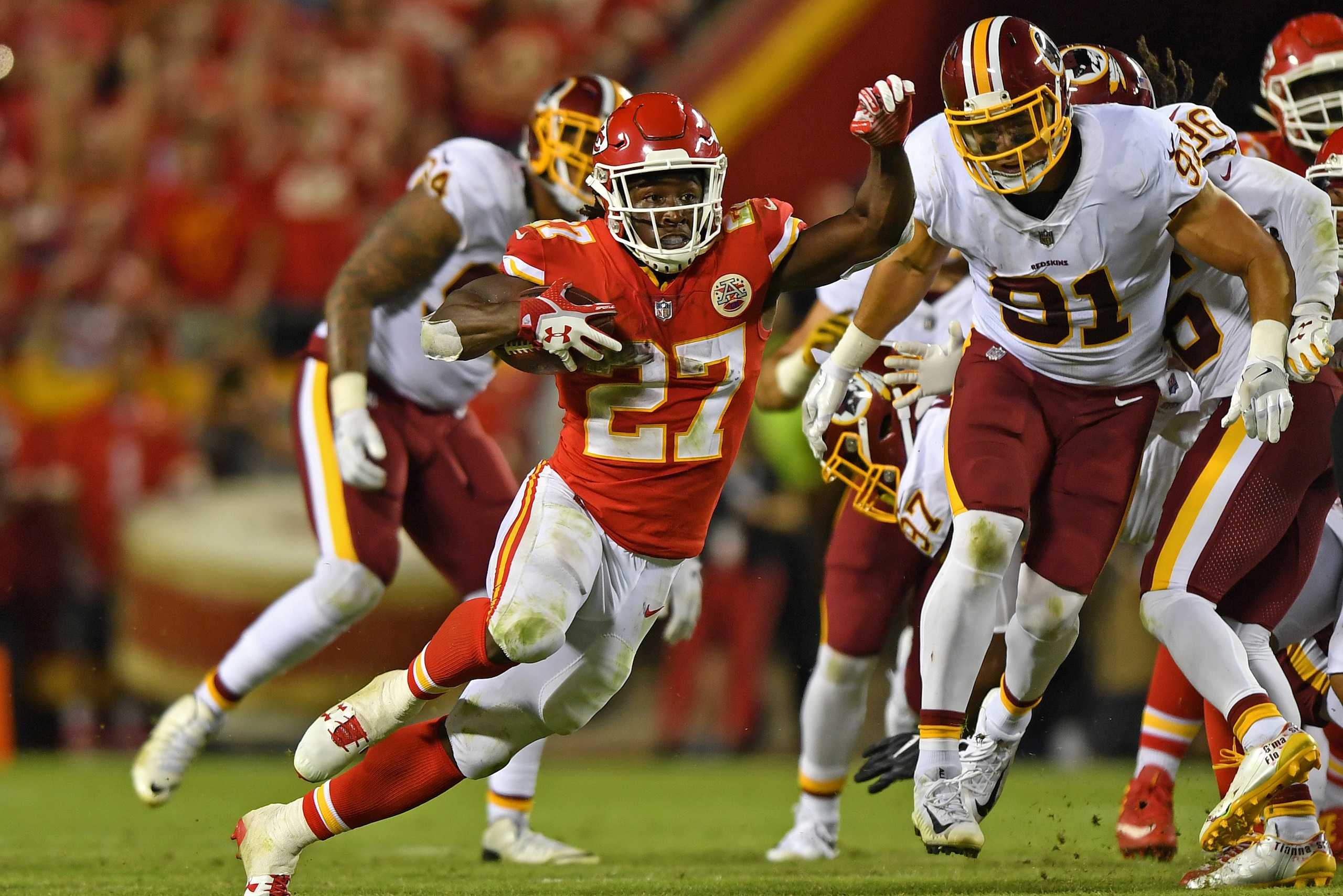 KANSAS CITY, MO - OCTOBER 02:  Running back Kareem Hunt #27 of the Kansas City Chiefs rushes down field against the Washington Redskins during the second half on October 2, 2017 at Arrowhead Stadium in Kansas City, Missouri.  (Photo by Peter G. Aiken/Gett