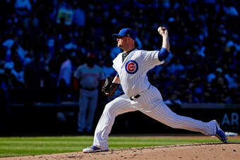 CHICAGO, IL - SEPTEMBER 30:  Jon Lester #34 of the Chicago Cubs pitches against the Cincinatti Reds during the second inning at Wrigley Field on September 30, 2017 in Chicago, Illinois.  (Photo by Jon Durr/Getty Images)