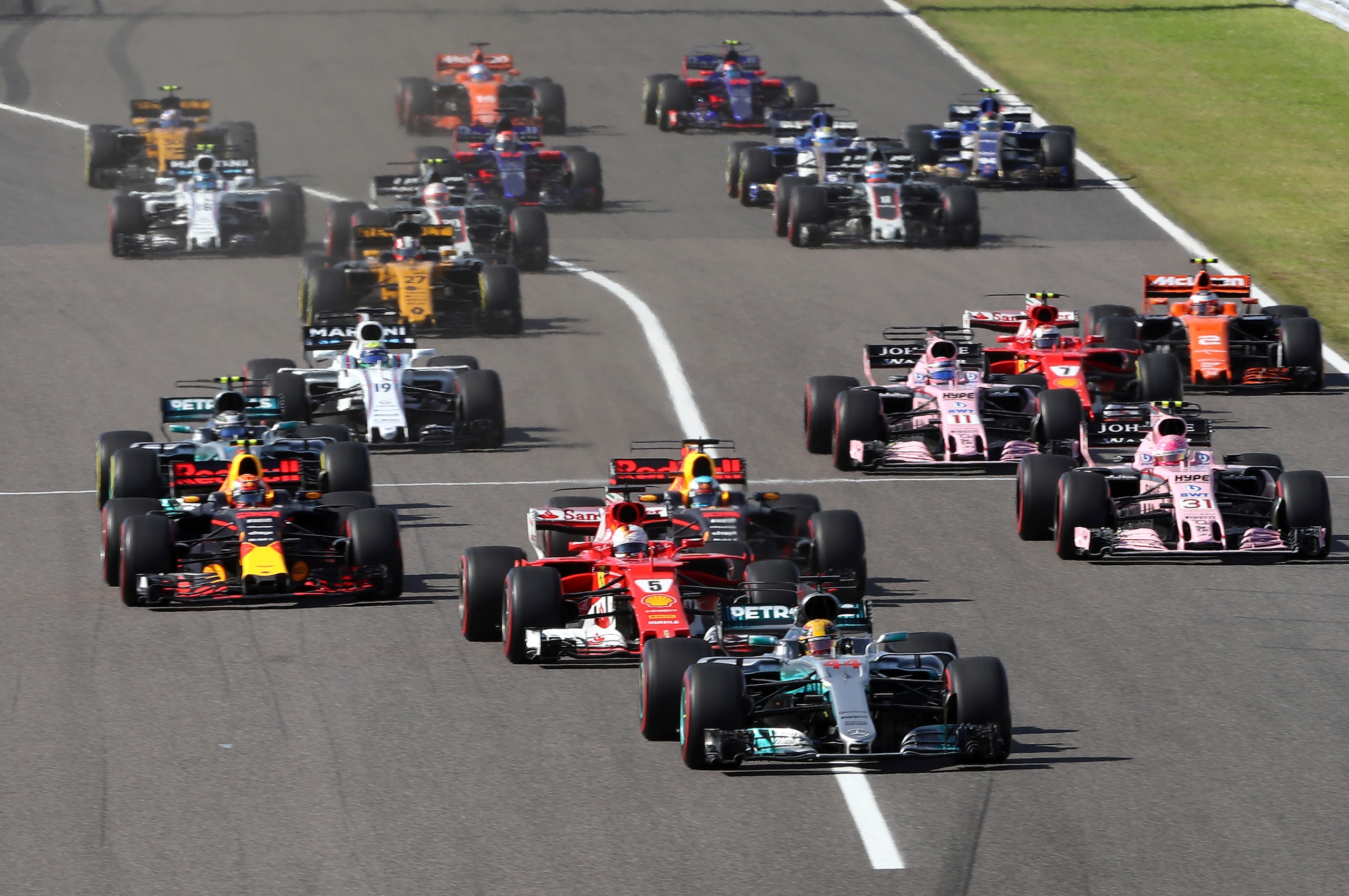 Hamilton stayed ahead of Vettel off the line.