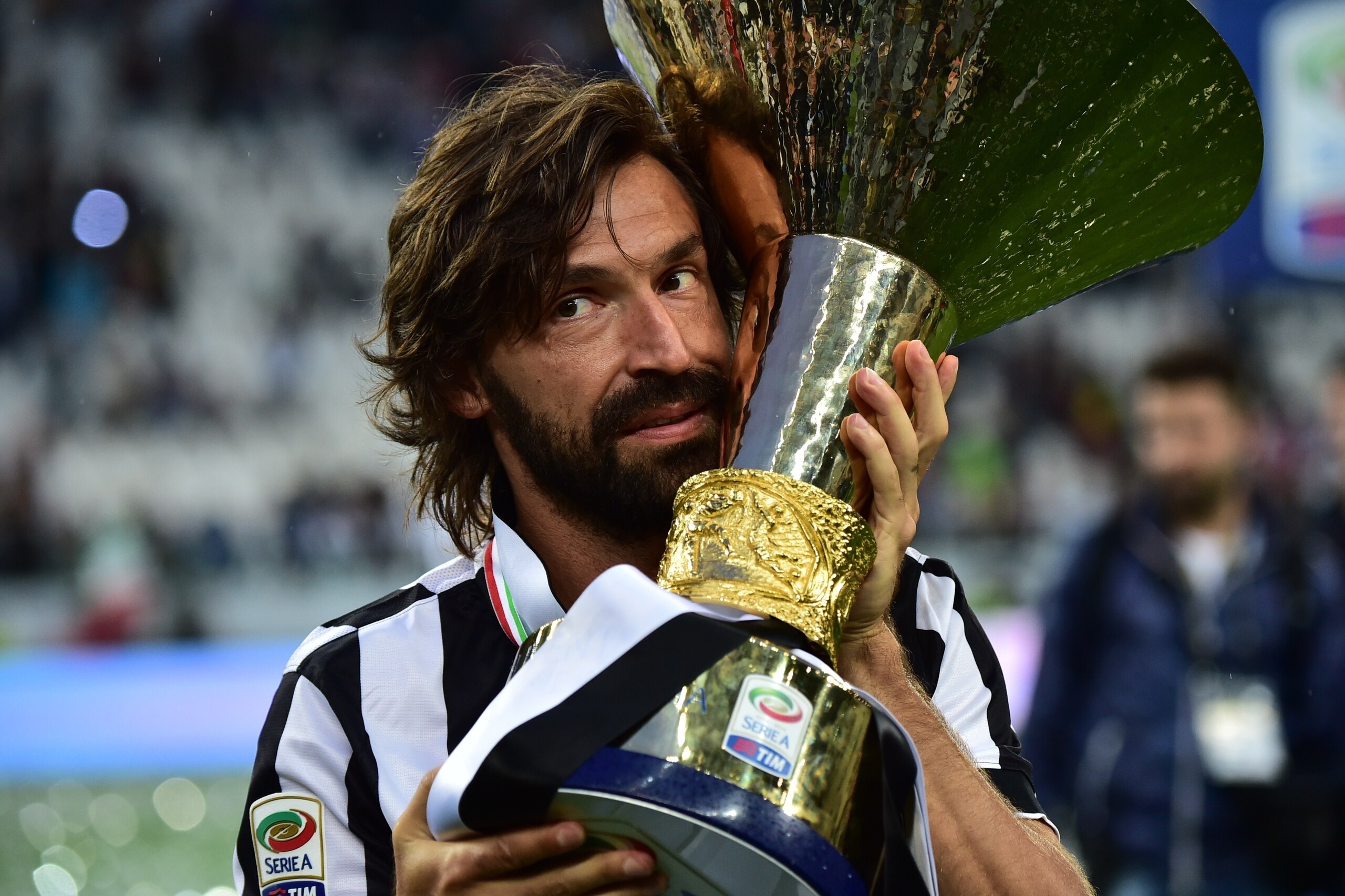 Juventus' midfielder Andrea Pirlo poses with the Italian League's trophy during a ceremony following the Italian Serie A football match Juventus vs Napoli on May 23, 2015 at the Juventus stadium in Turin. Juventus won the Coppa Italia on May 20, 2015 and Juventus' midfielder Andrea Pirlo poses with the Italian League's trophy during a ceremony following the Italian Serie A football match Juventus vs Napoli on May 23, 2015 at the Juventus stadium in Turin. Juventus won the Coppa Italia on May 20, 2015 and