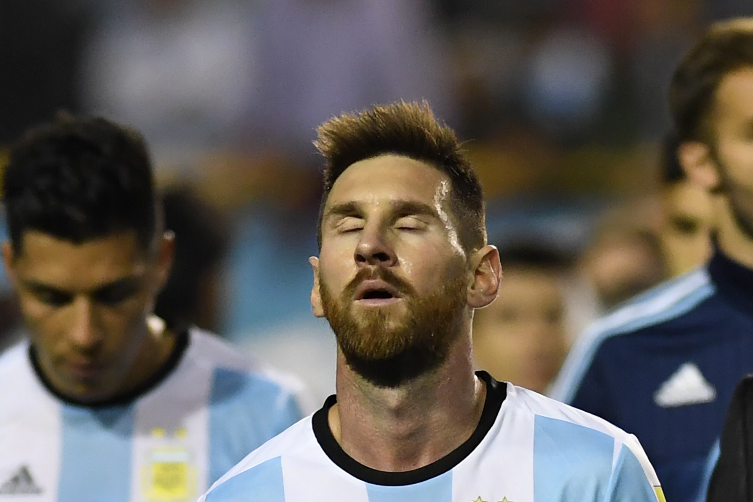 Argentina's Lionel Messi gestures at the end of their 2018 World Cup football qualifier match against Peru, in Buenos Aires on October 5, 2017. / AFP PHOTO / EITAN ABRAMOVICH        (Photo credit should read EITAN ABRAMOVICH/AFP/Getty Images)