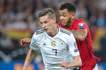 STUTTGART, GERMANY - SEPTEMBER 04: Joshua King of Norway, Julian Draxler of Germany during the FIFA 2018 World Cup Qualifier between Germany and Norway at Mercedes-Benz Arena on September 4, 2017 in Stuttgart, Baden-Wuerttemberg. (Photo by Trond Tandberg/