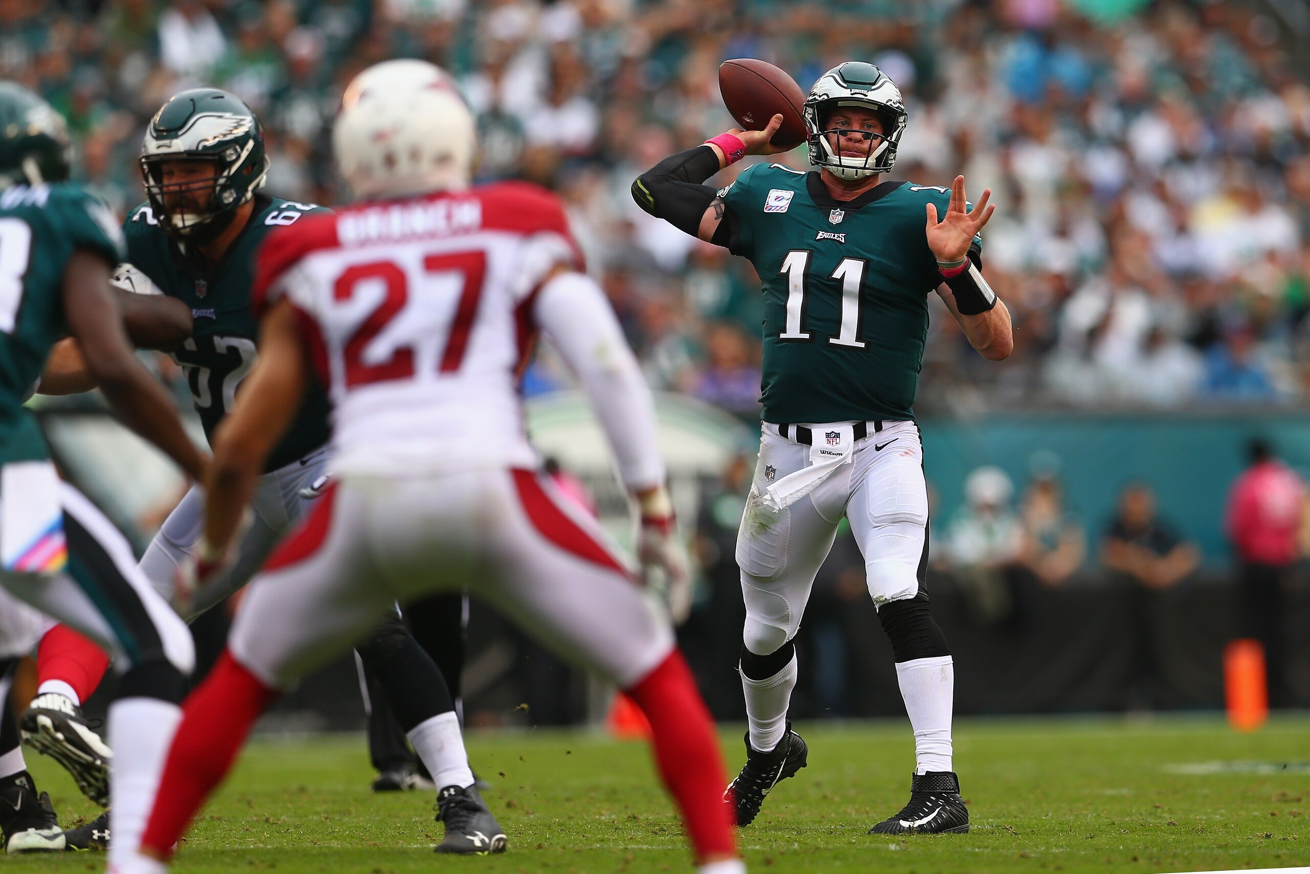 PHILADELPHIA, PA - OCTOBER 08: Quarterback Carson Wentz #11 of the Philadelphia Eagles looks turnover pass against the Arizona Cardinals during the second quarter at Lincoln Financial Field on October 8, 2017 in Philadelphia, Pennsylvania. (Photo by Mi PHILADELPHIA, PA - OCTOBER 08: Quarterback Carson Wentz #11 of the Philadelphia Eagles looks turnover pass against the Arizona Cardinals during the second quarter at Lincoln Financial Field on October 8, 2017 in Philadelphia, Pennsylvania. (Photo by Mi